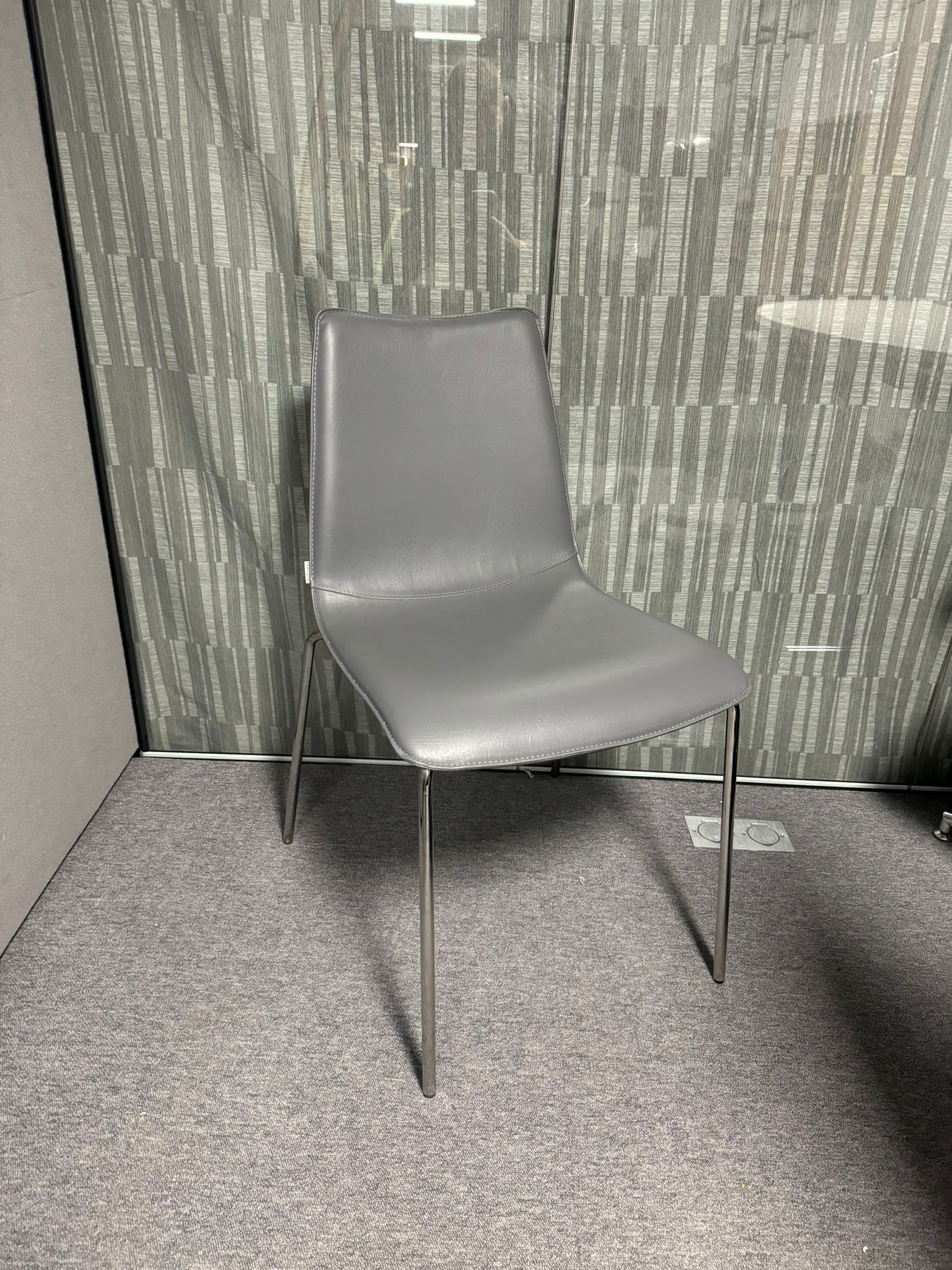 BRAND NEW Torre Italian stackable chair, chrome frame with grey leather seat and back. 4124