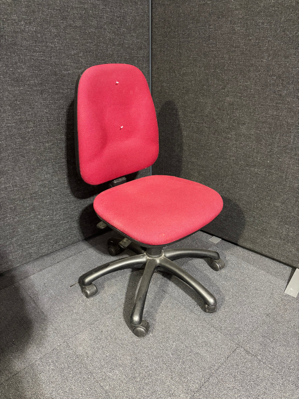 Red fabric second hand swivel chair- no arms