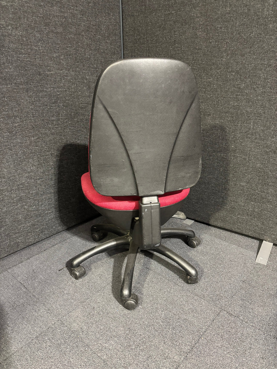 Red fabric second hand swivel chair- no arms