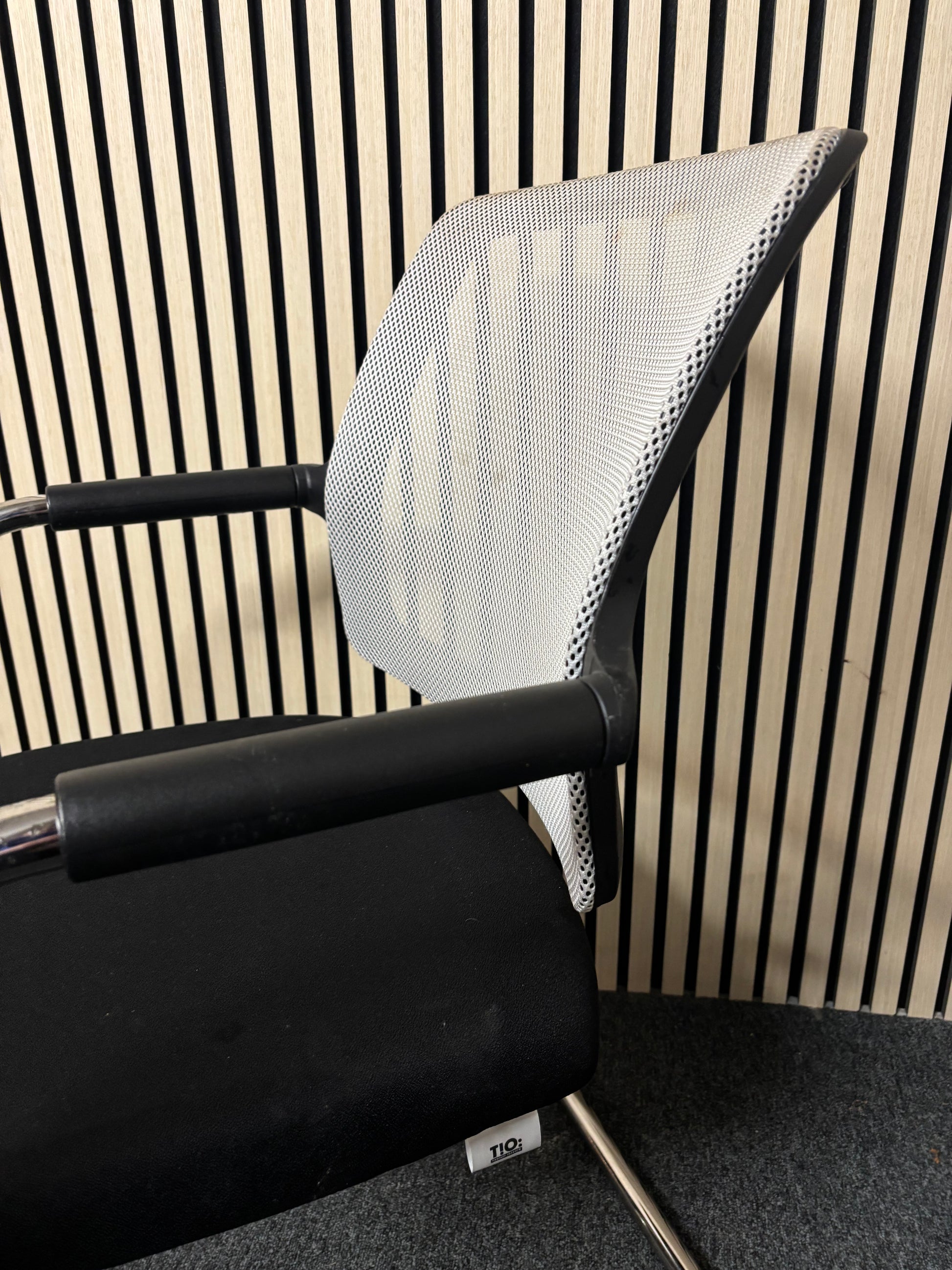 White mesh back black fabric seat chrome framed meeting chair