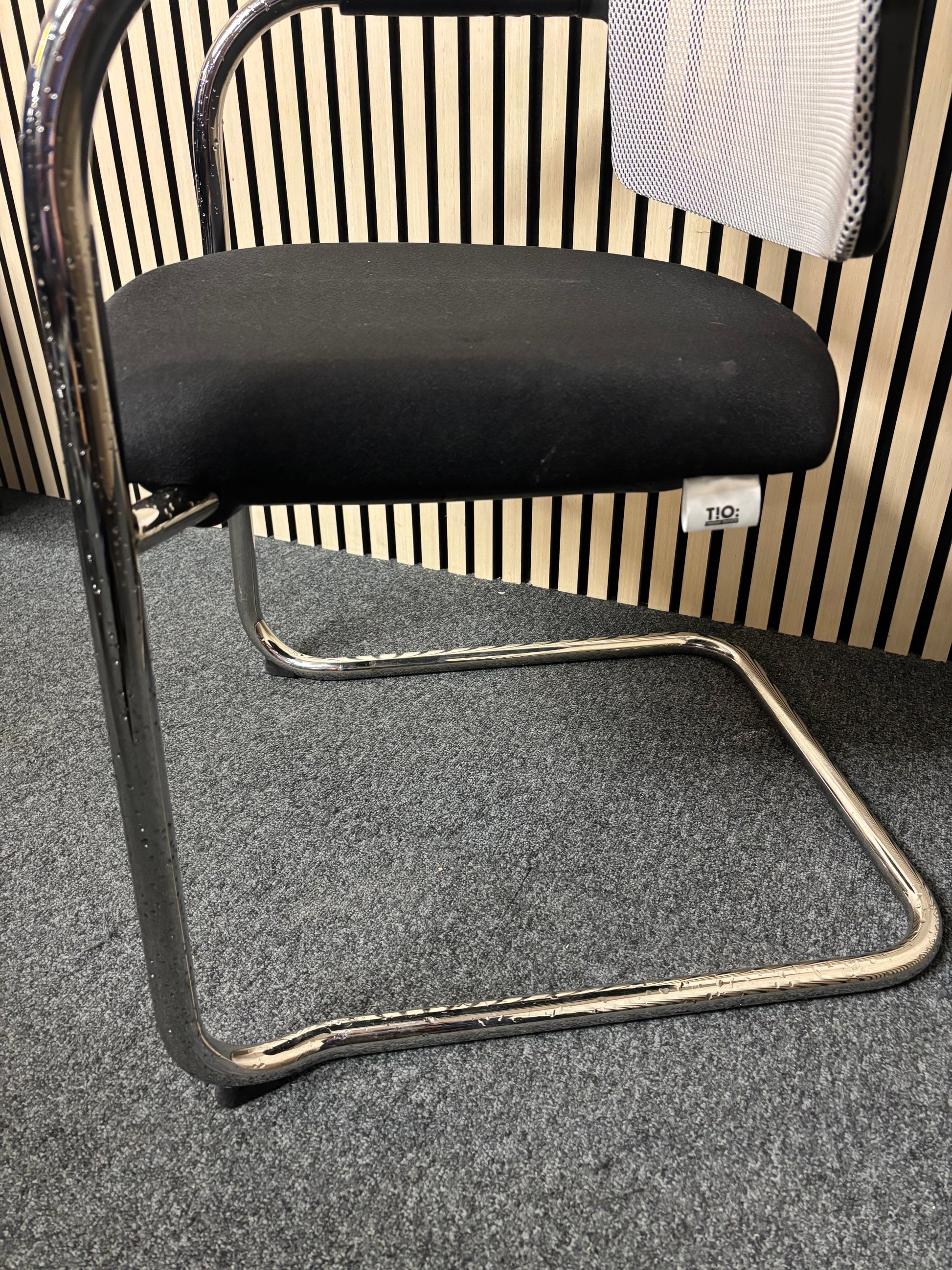 White mesh back black fabric seat chrome framed meeting chair