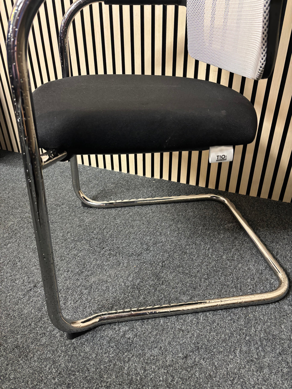 White mesh back black fabric seat chrome framed meeting chair