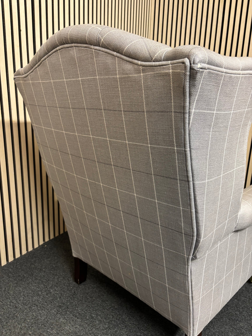 Solid wooden framed grey tartan effect fabric button back armchair on castors 2325