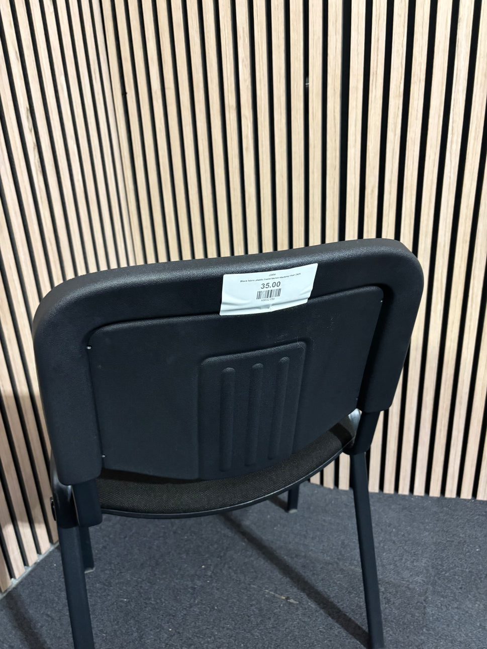 Black fabric plastic frame taurus stacking chair 2425