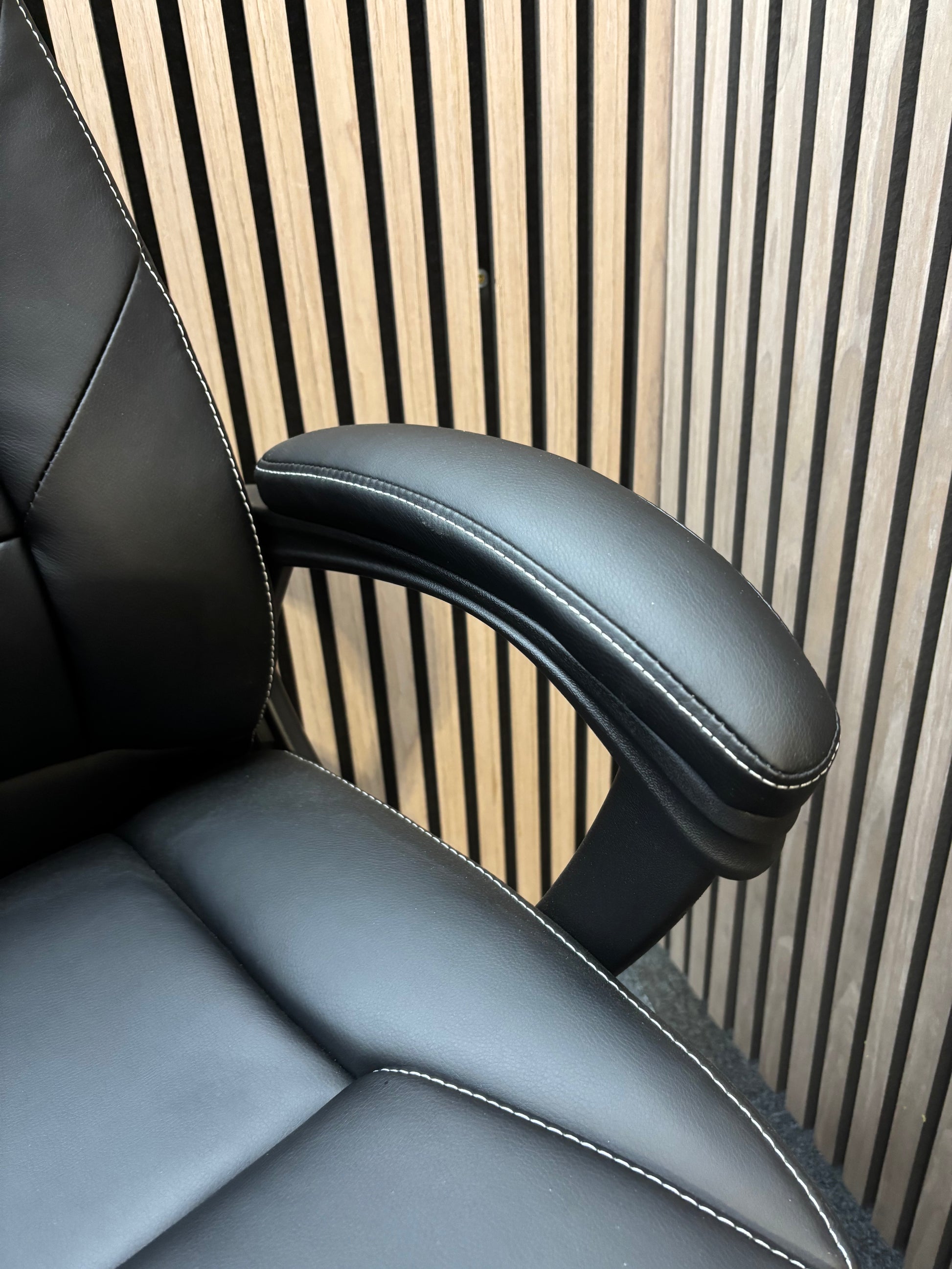 NEW Noble managers cantilever meeting chair with arms, black PU leatherette and black metal cantilever base. Price in VAT