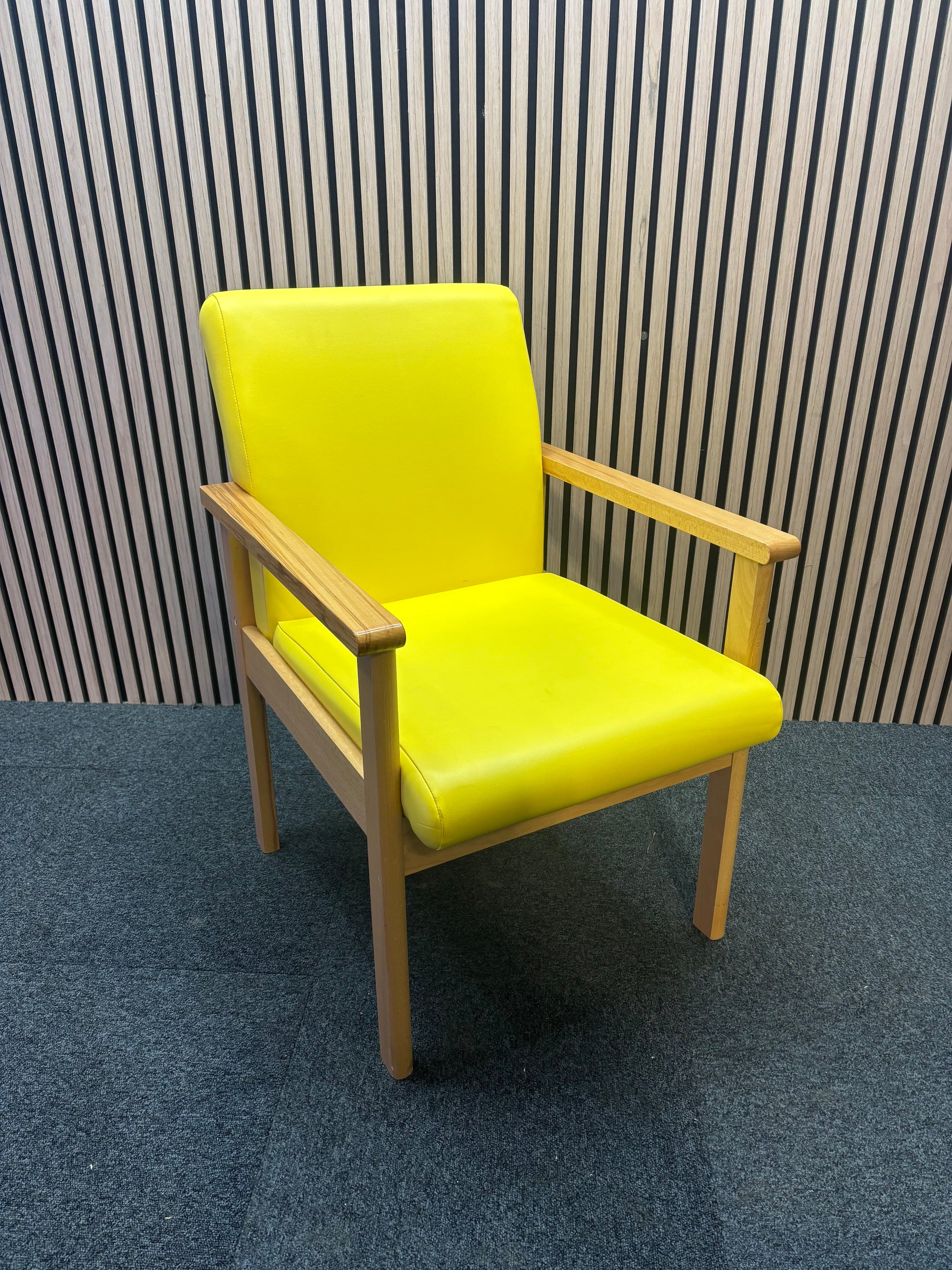 Yellow Meavy reception chair with leatherette seats