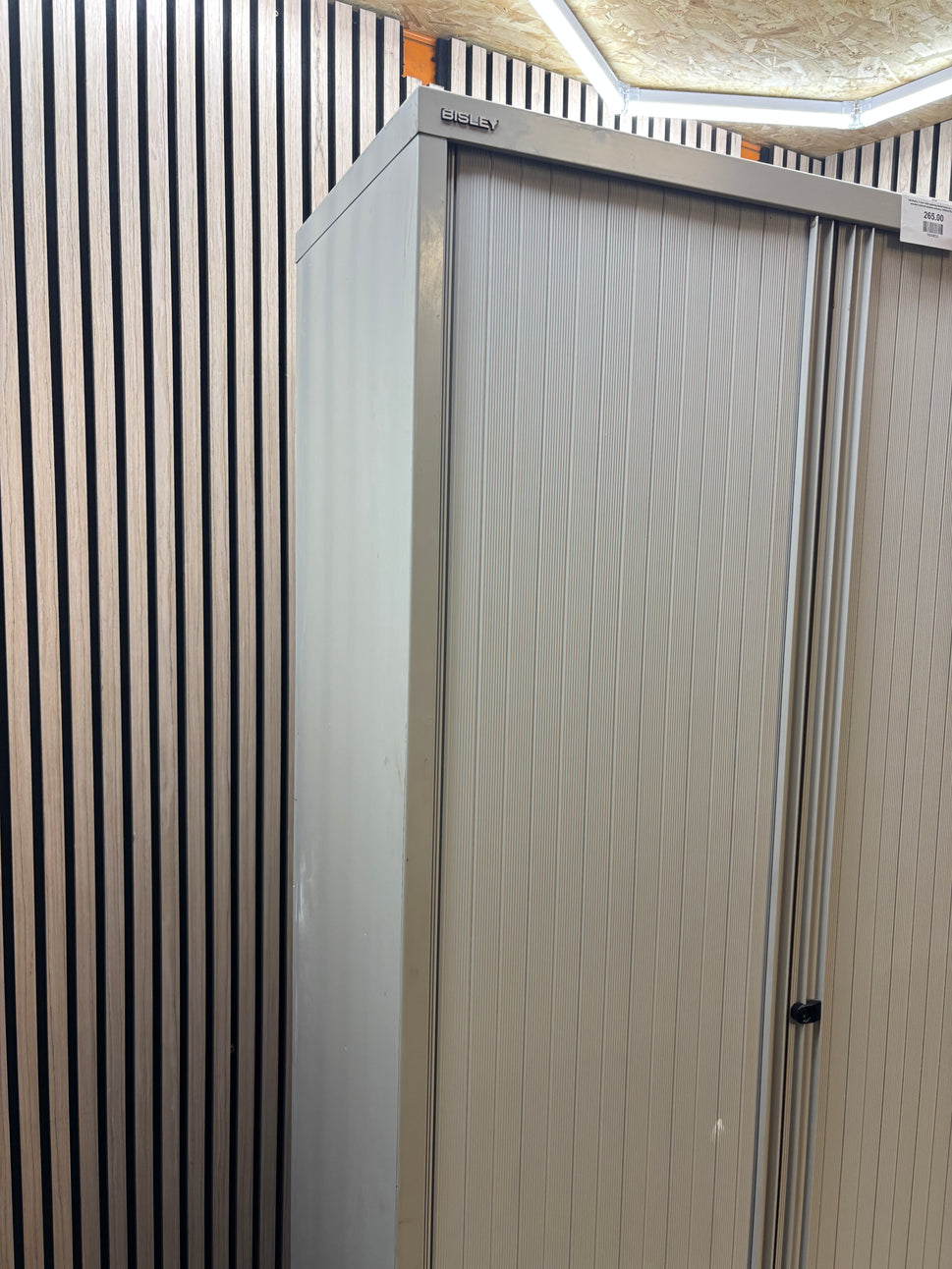 Tall Bisley 2 door side opening metal tambour unit with wooden internal shelves and key 100Wx47Dx197H