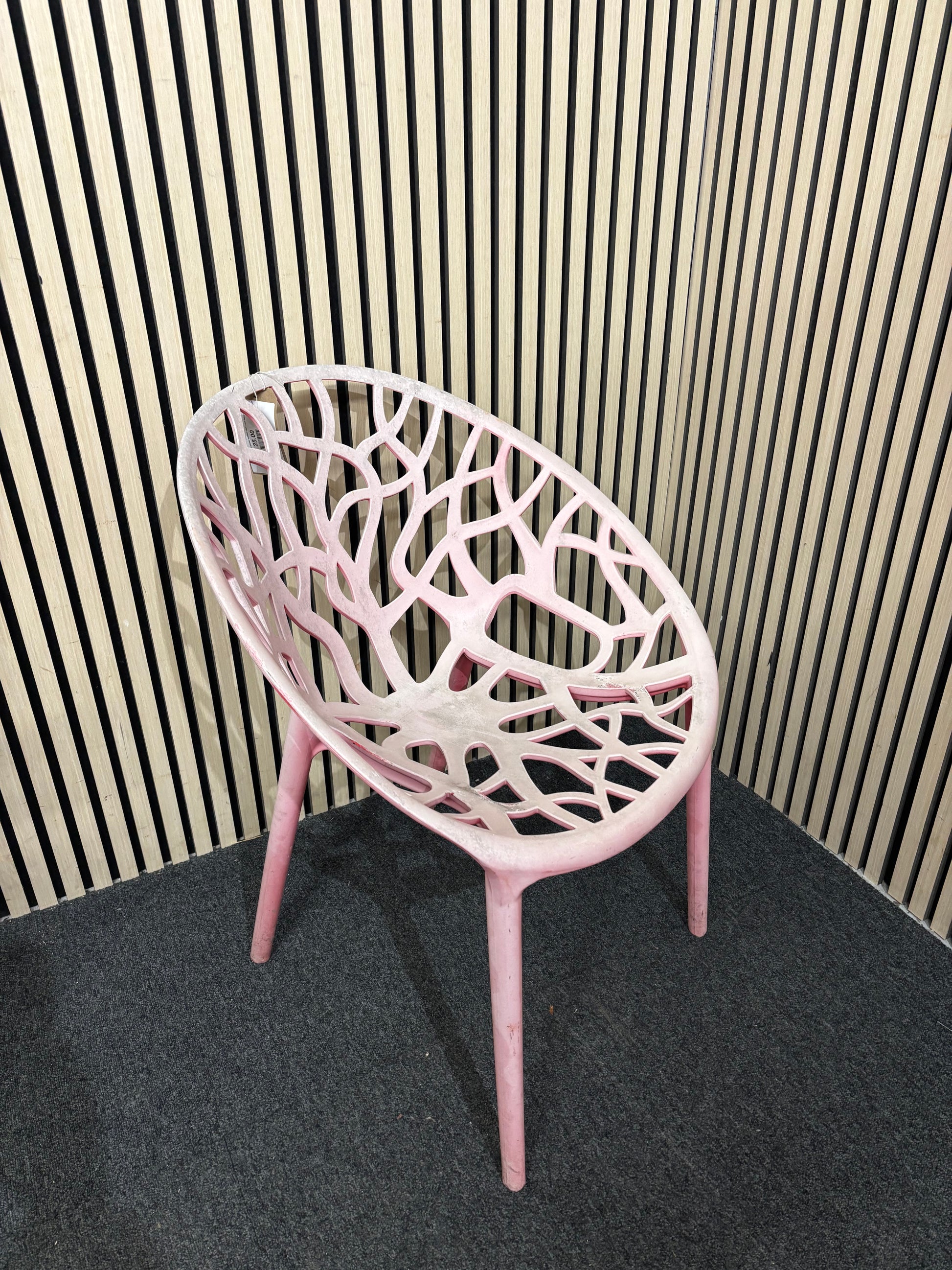 Light red stackable plastic outdoor chair - sun faded 3126