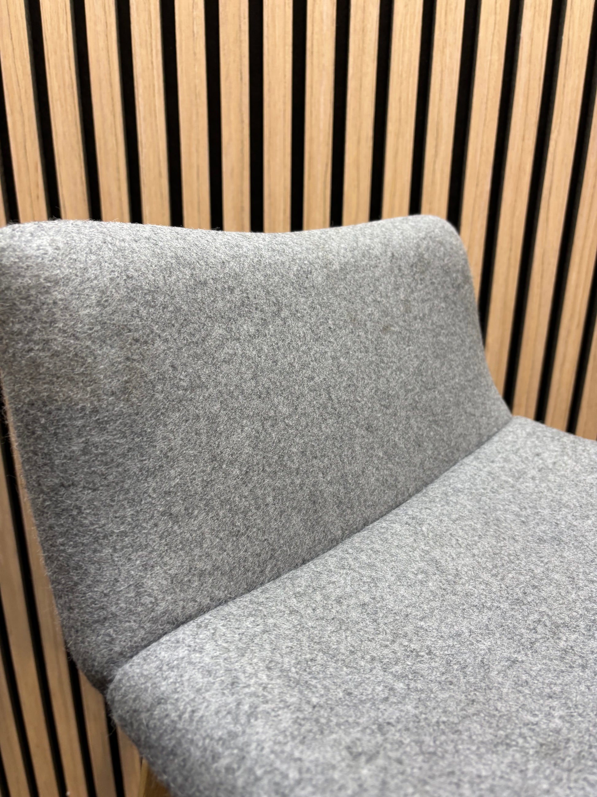 Remy fully upholstered high stool with solid wooden frame and soft grey fabric