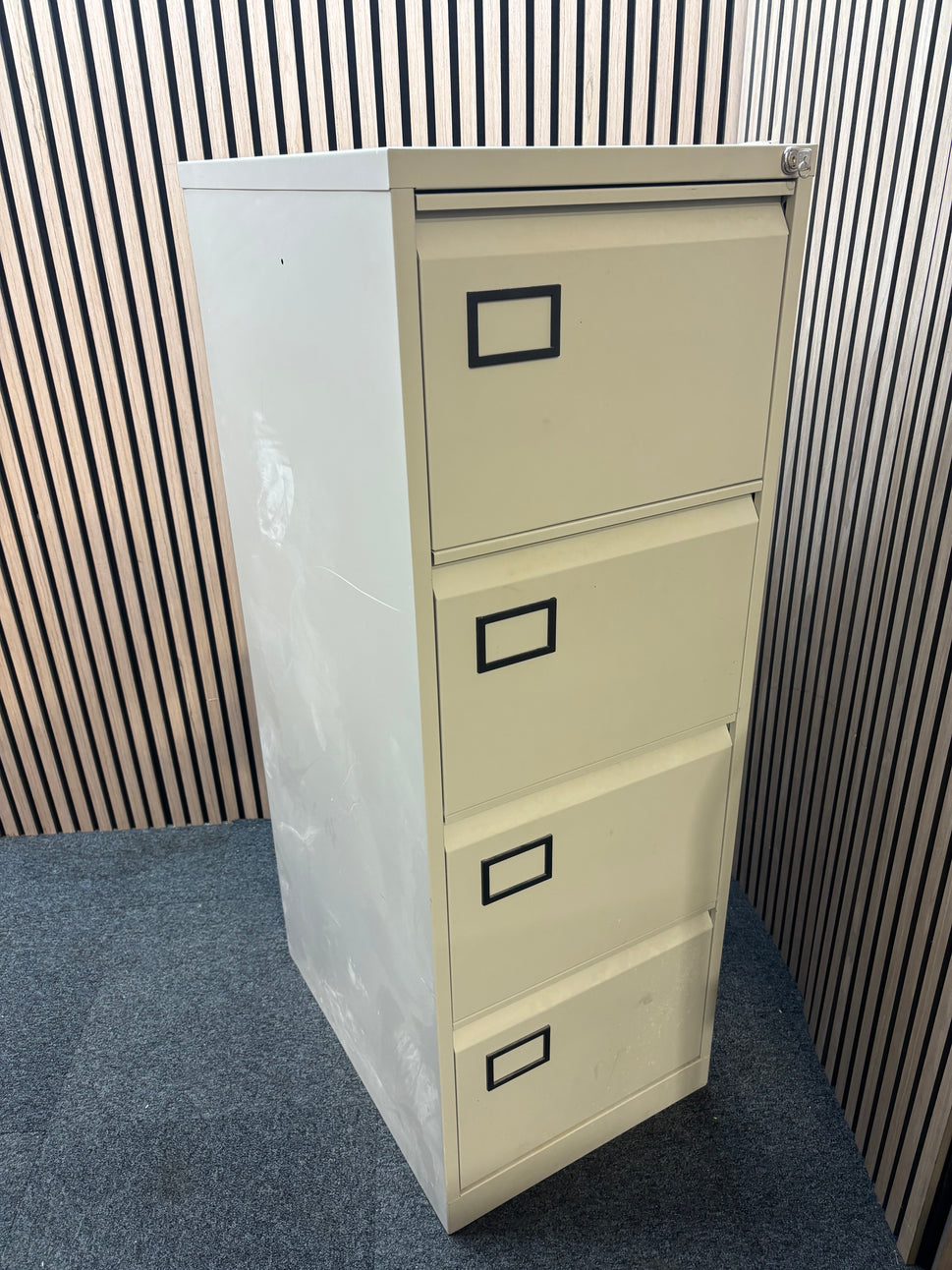 Grey metal 4 drawer filing cabinet with key