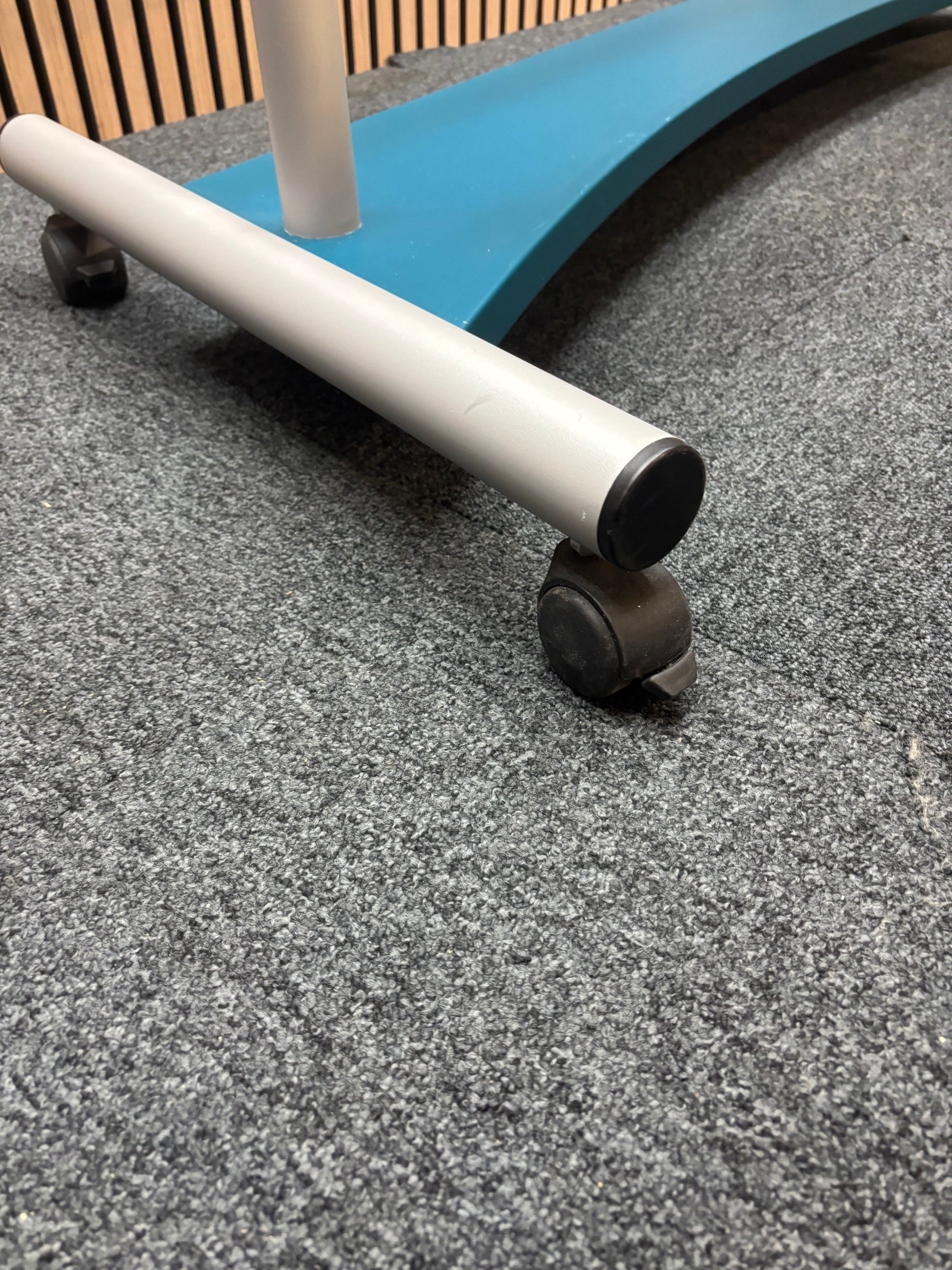 Large mobile whiteboard on castors