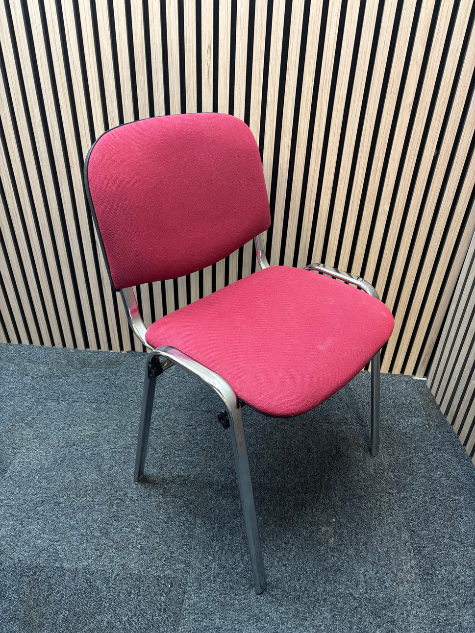 Red fabric solid metal framed stacking chair