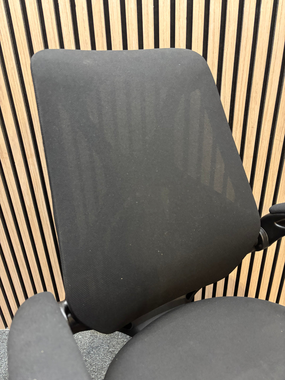 NEW Napier black fabric height adjustable swivel chair with black fabric pivot arms. PRICE INC VAT