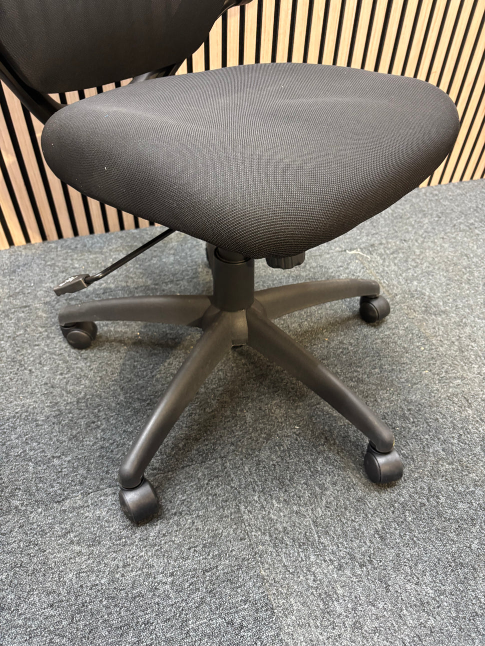 NEW Napier black fabric height adjustable swivel chair with black fabric pivot arms. PRICE INC VAT