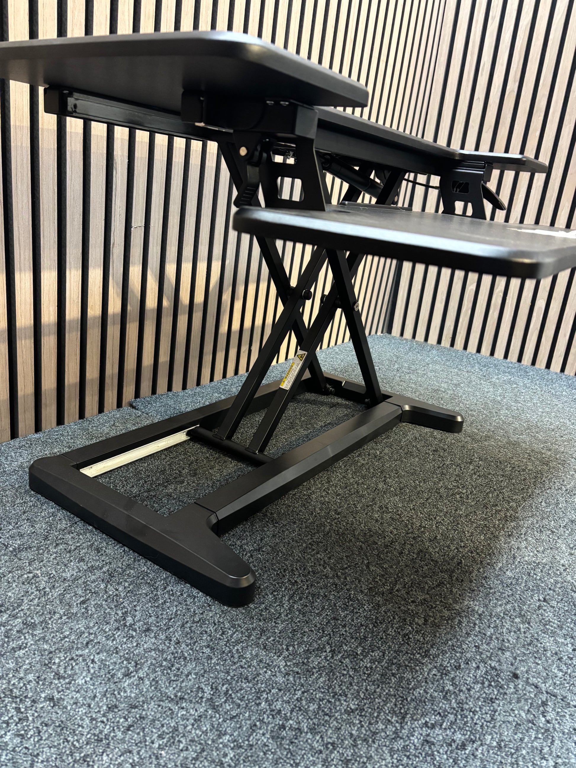 Black plastic desk raiser