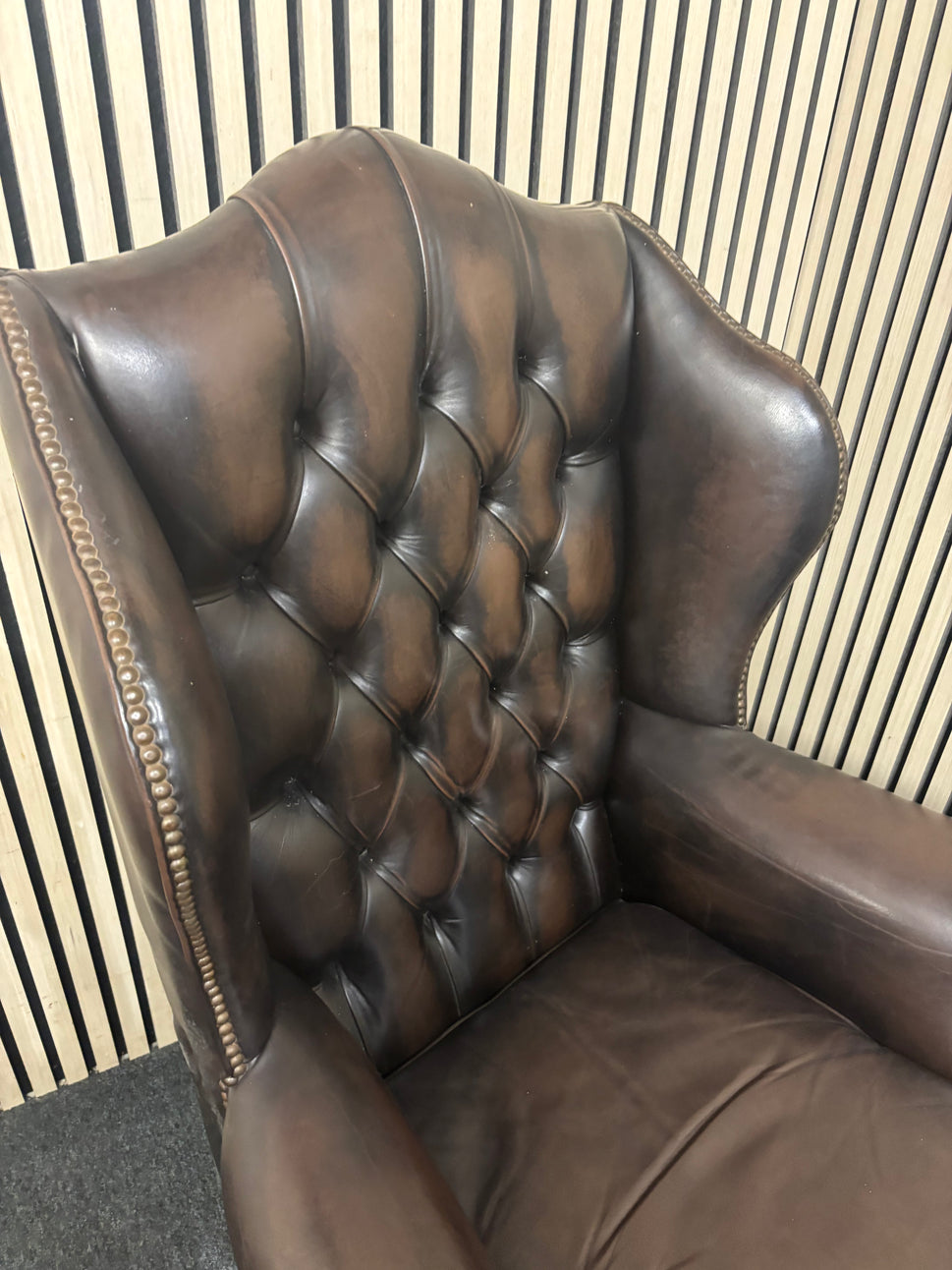 High wing back dark brown leather chesterfield armchair 43508