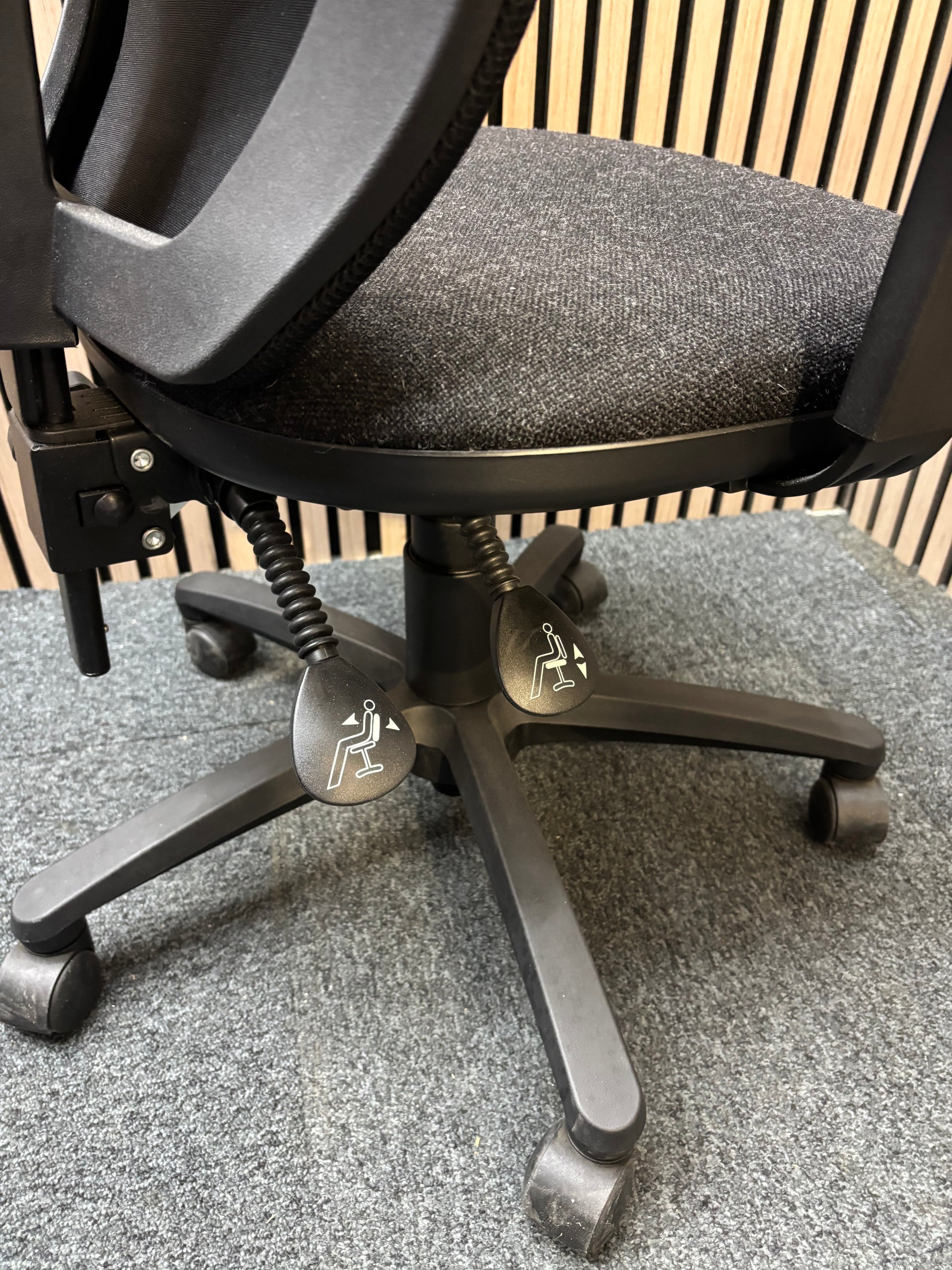 Black mesh back swivel chair with charcoal fabric seat