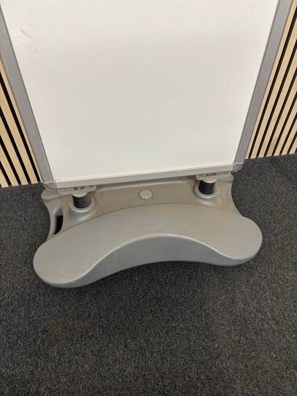 Large white plastic sandwich board on stand