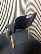 NEW black plastic taurus stacking chair with solid metal frame