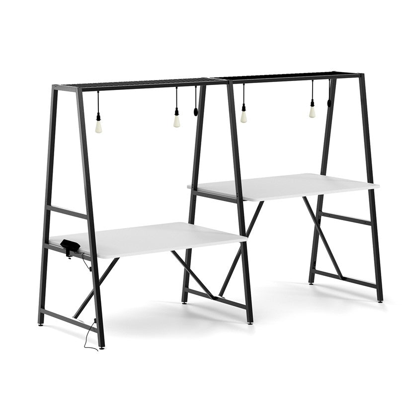 Trellis modular worktable with sit and stand heights in a black solid metal frame