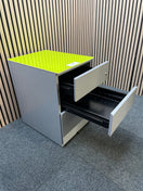 Grey metal mobile pedestal with lime green top
