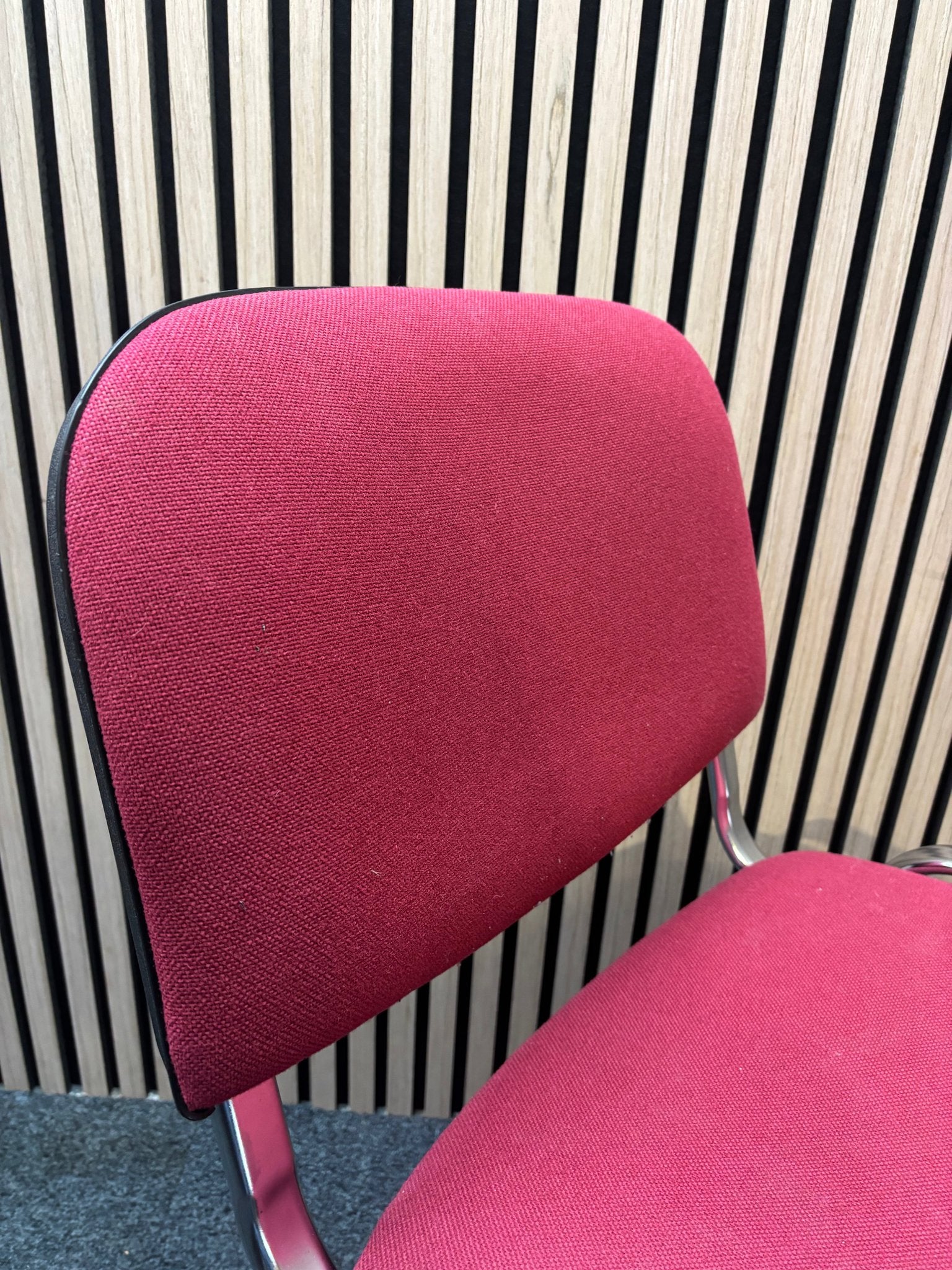 Red fabric solid metal framed stacking chair
