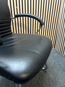 Black leatherette solid metal framed meeting chair with arms