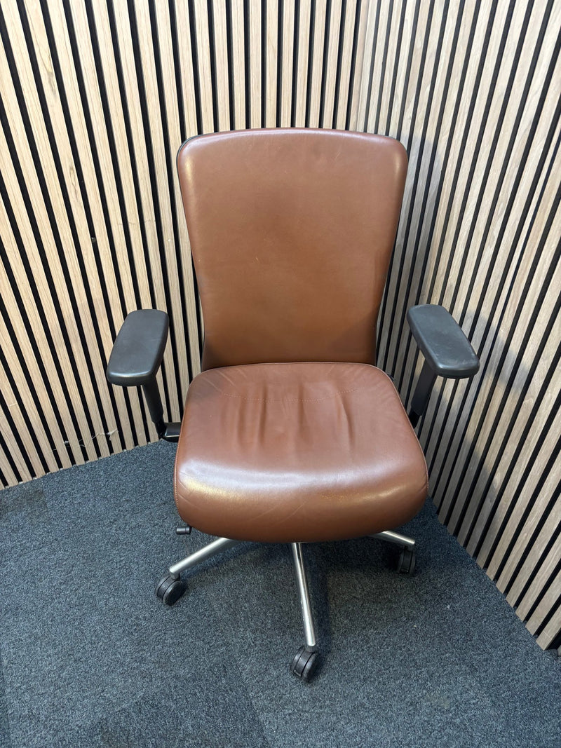 Girsberger high back brown leather multifunction swivel chair with adjustable arms and back rake with polished metal base on castors J3910