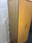Tall oak 2 door storage unit with internal wooden shelves and key 180Hx47Dx80W J3927