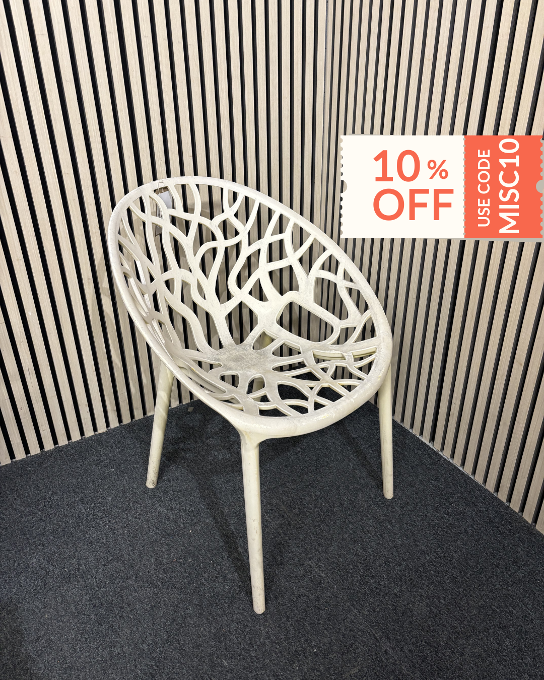 white stackable plastic outdoor chair - sun faded 3126