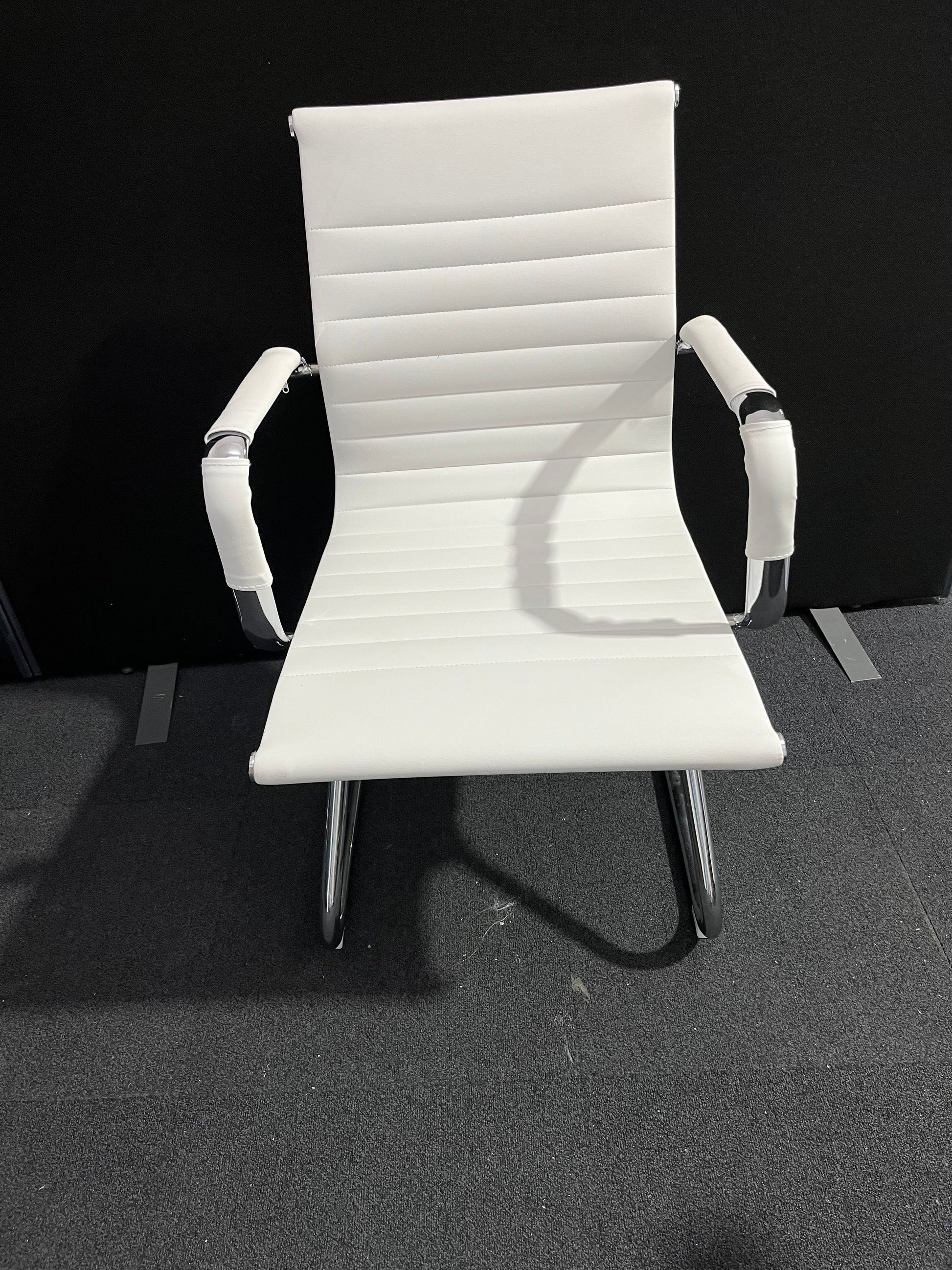Cream leather chrome framed cantilever meeting chair