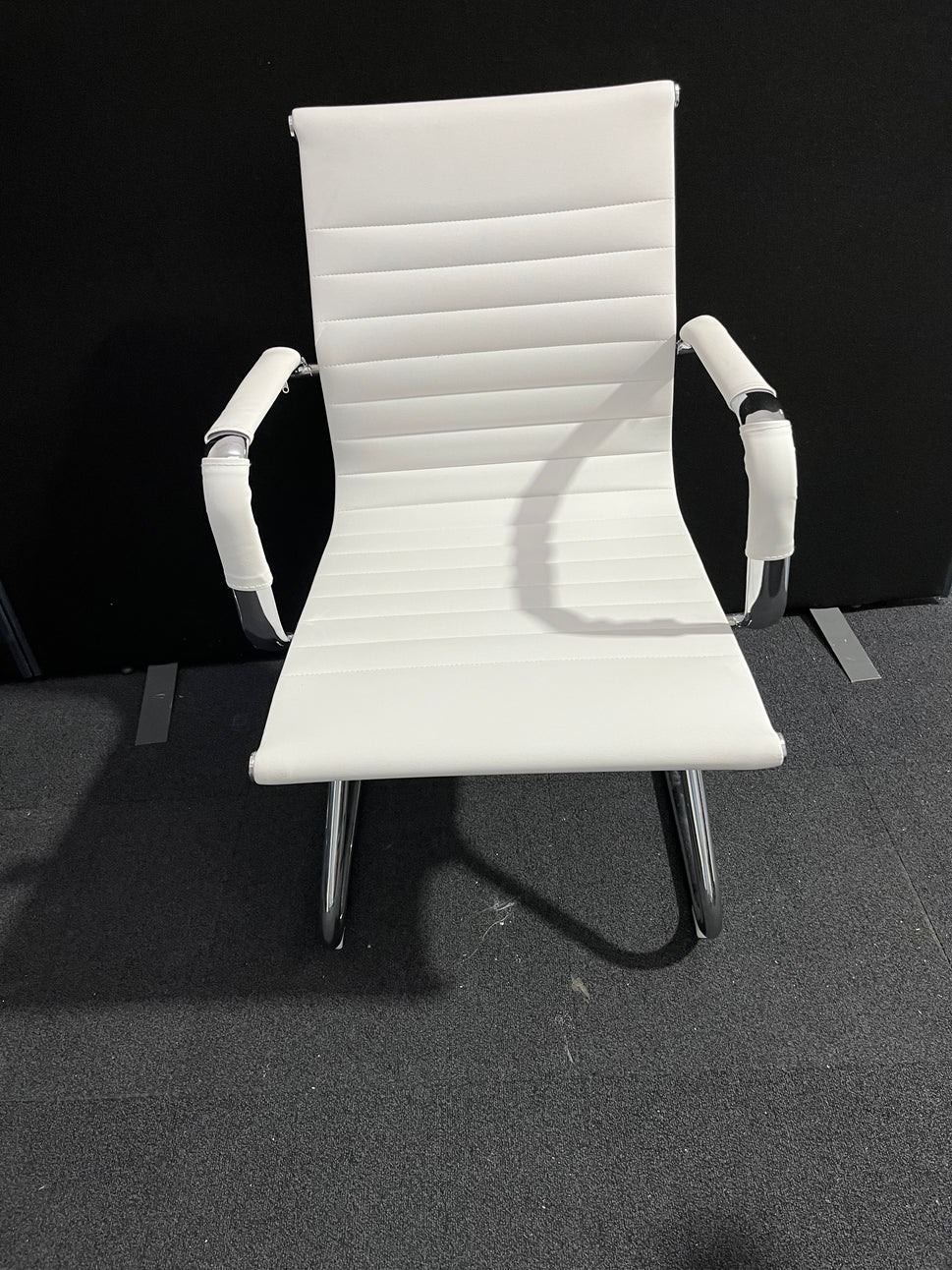 Cream leather chrome framed cantilever meeting chair