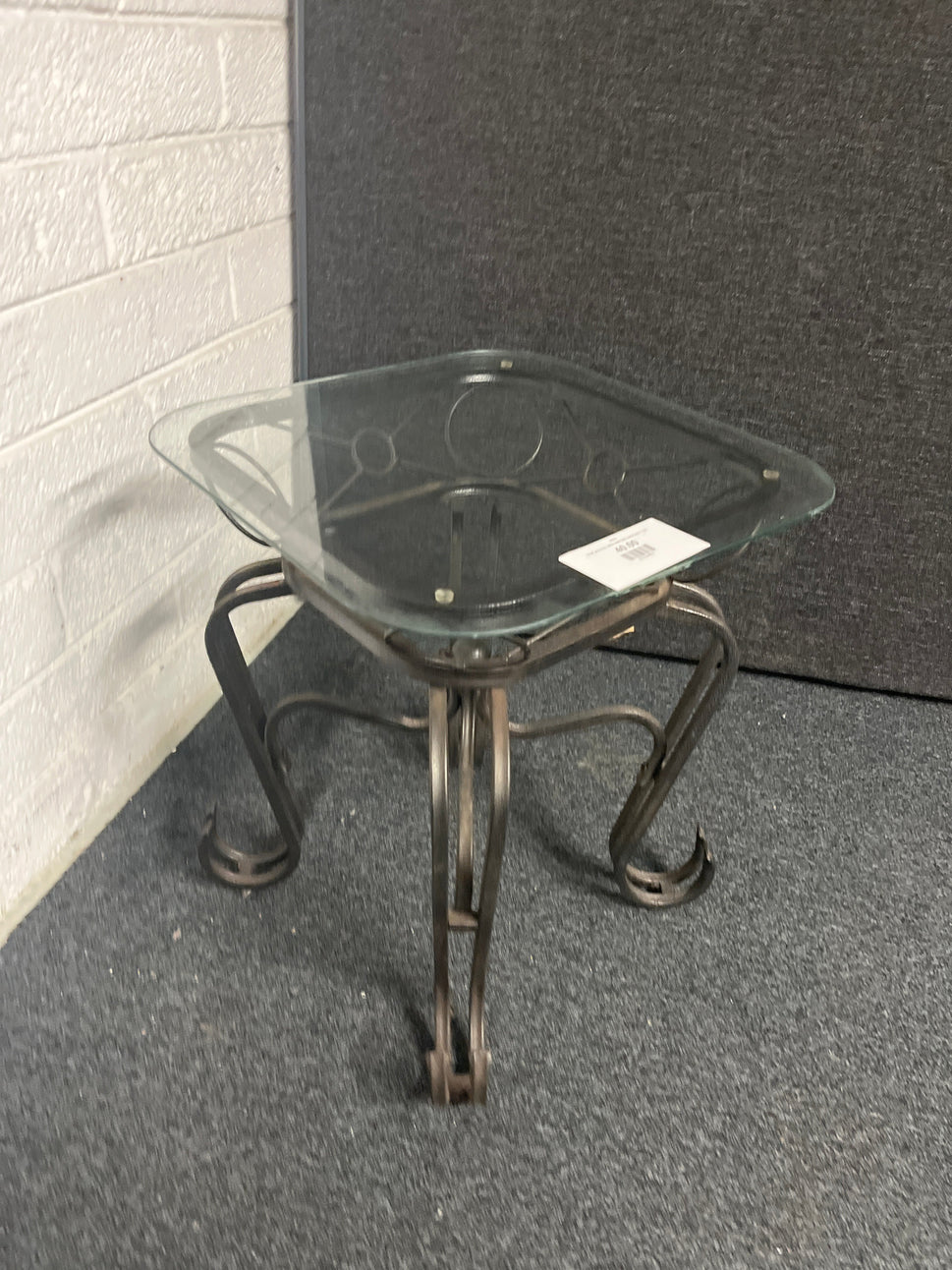 Small glass top coffee table with metal frame  1225
