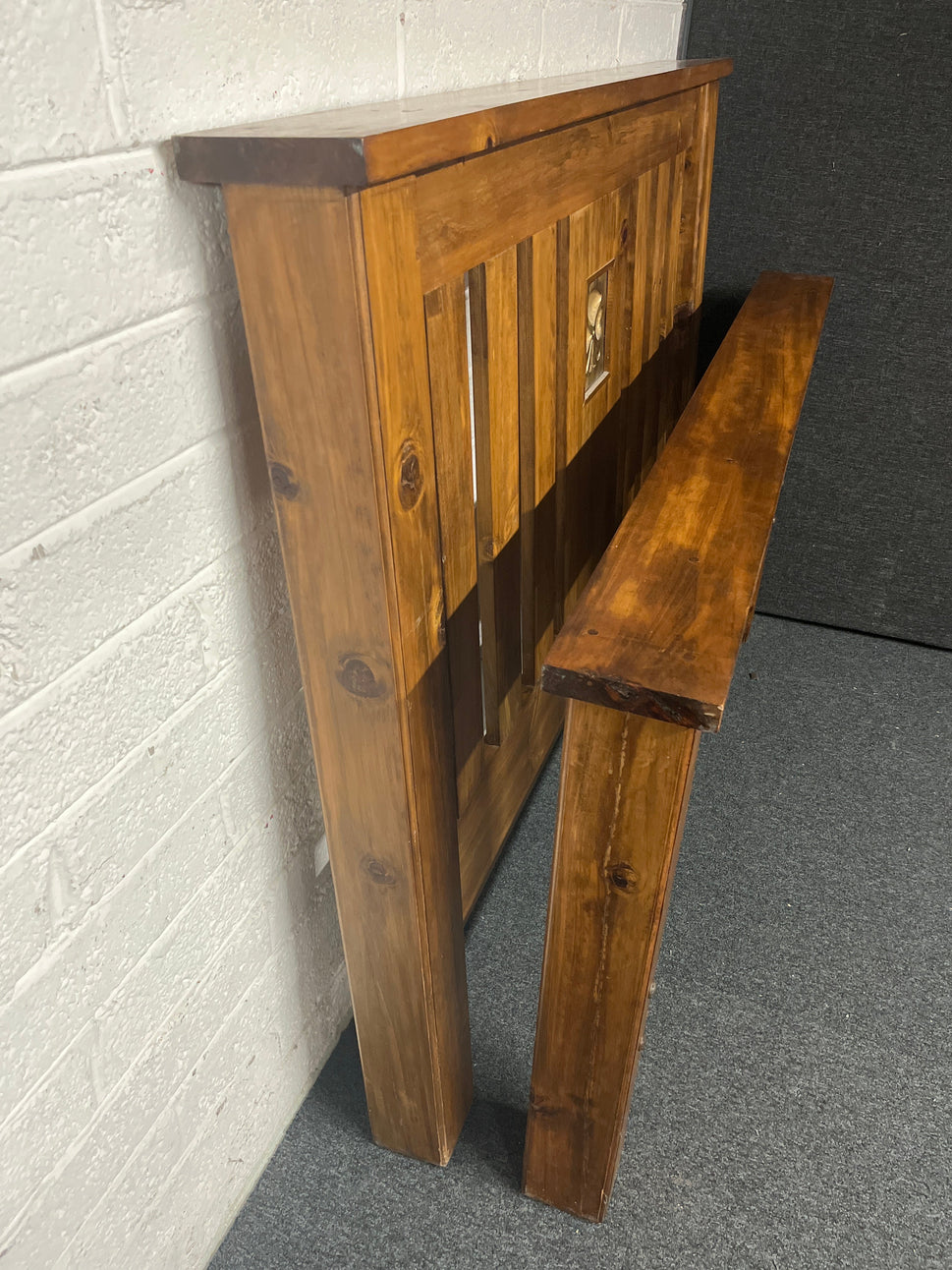5ft high and low end ornate solid pine stained bed frame with central gold design  1225