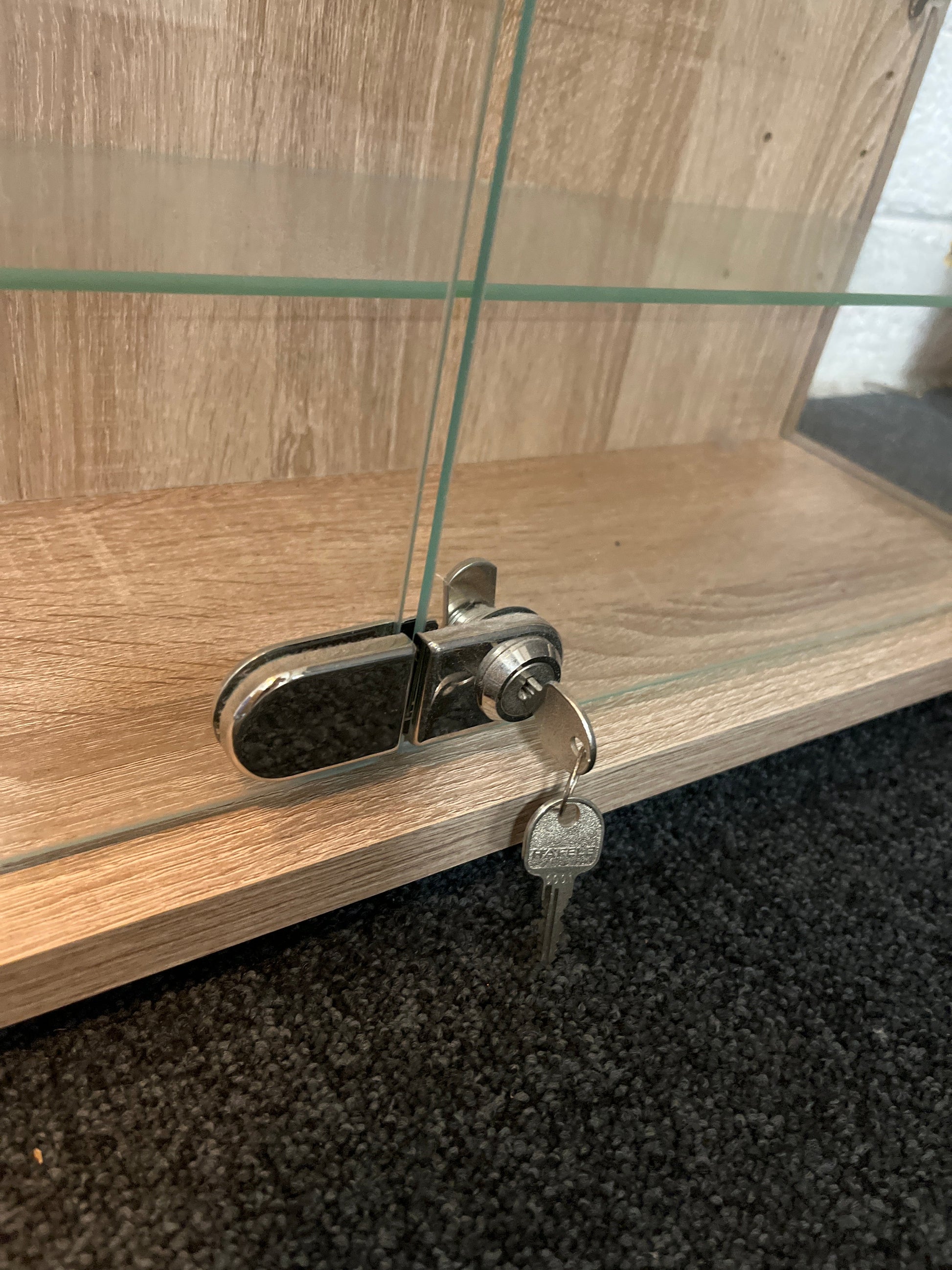 Oak laminate 2 glass door display unit with shelves and key 1100Hx670Wx195D  2225
