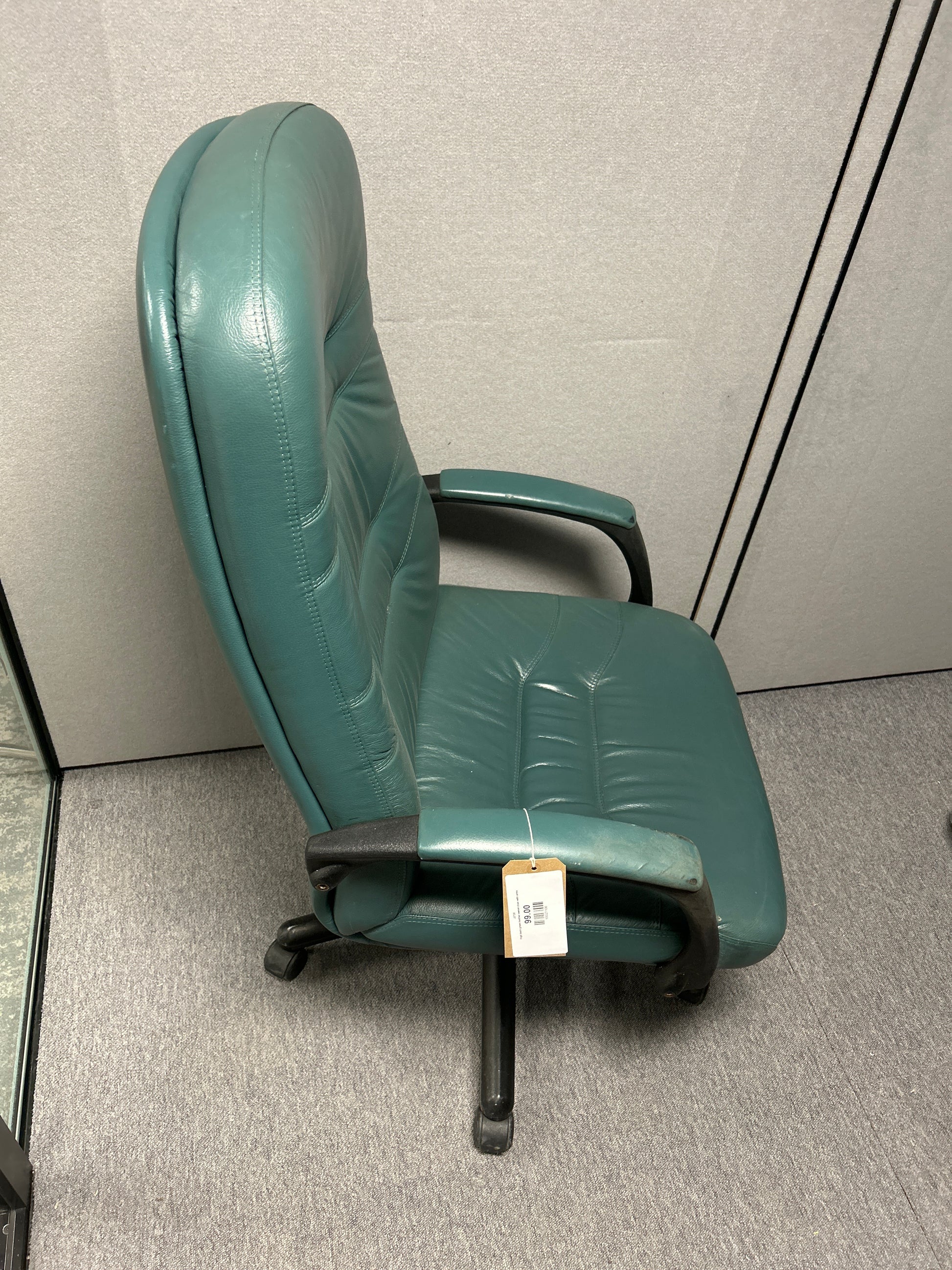 High back green leather swivel chair with arms