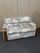 Switch Patterned two-seater sofa with wooden arm accents 2 image