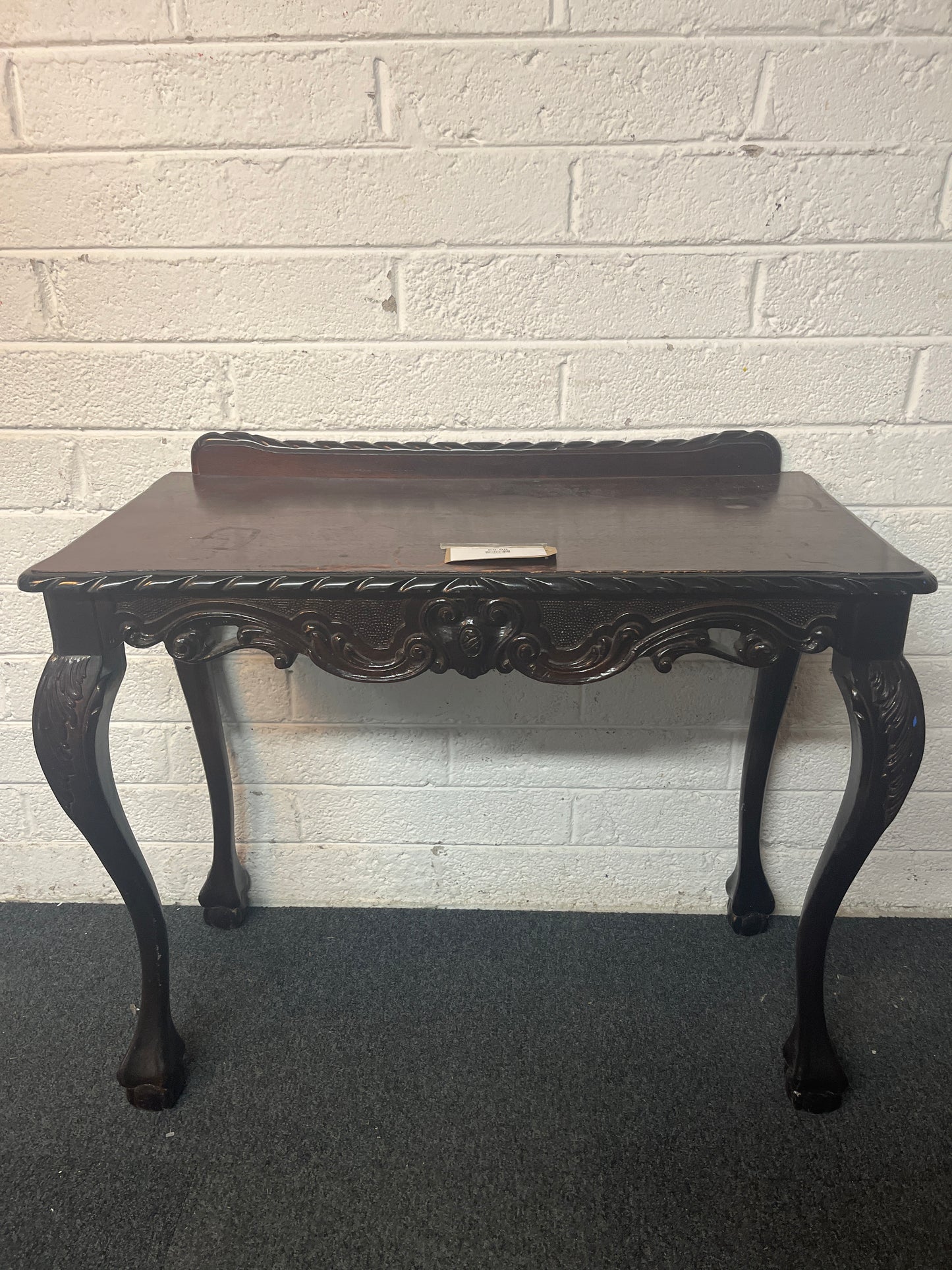 Ornate console mahogany table with upstand