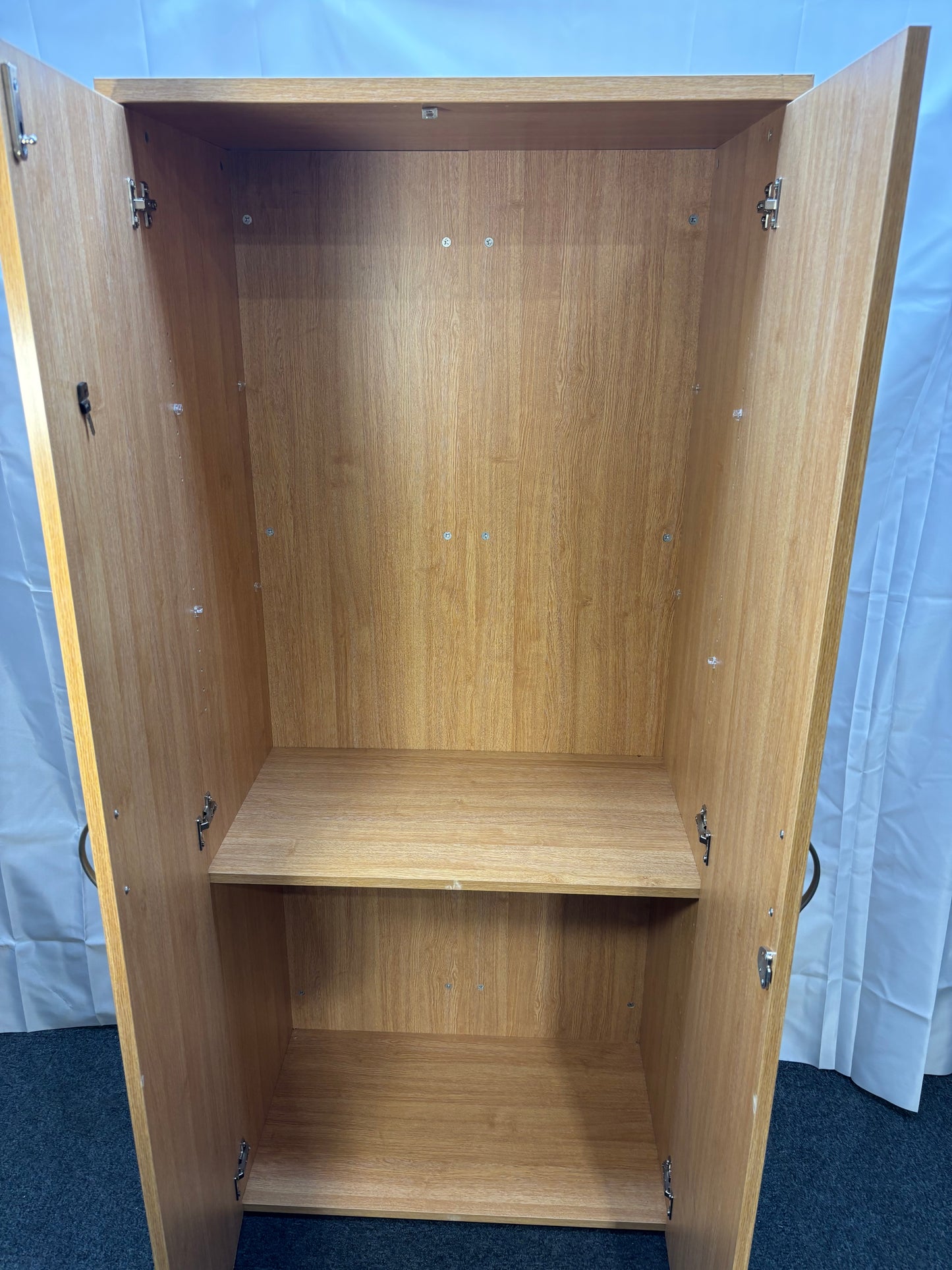 Tall oak 2 door storage unit with internal wooden shelves and key 180Hx47Dx80W  J3927