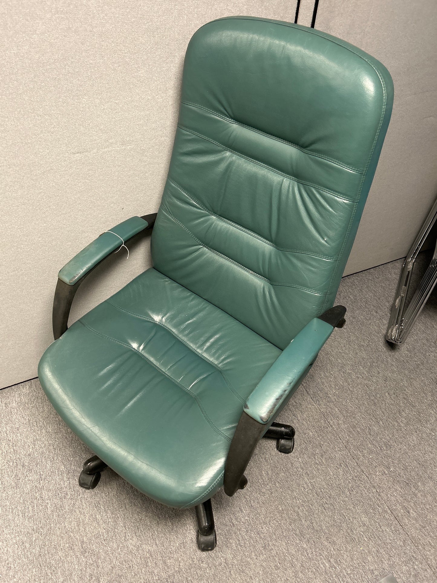 High back green leather swivel chair with arms