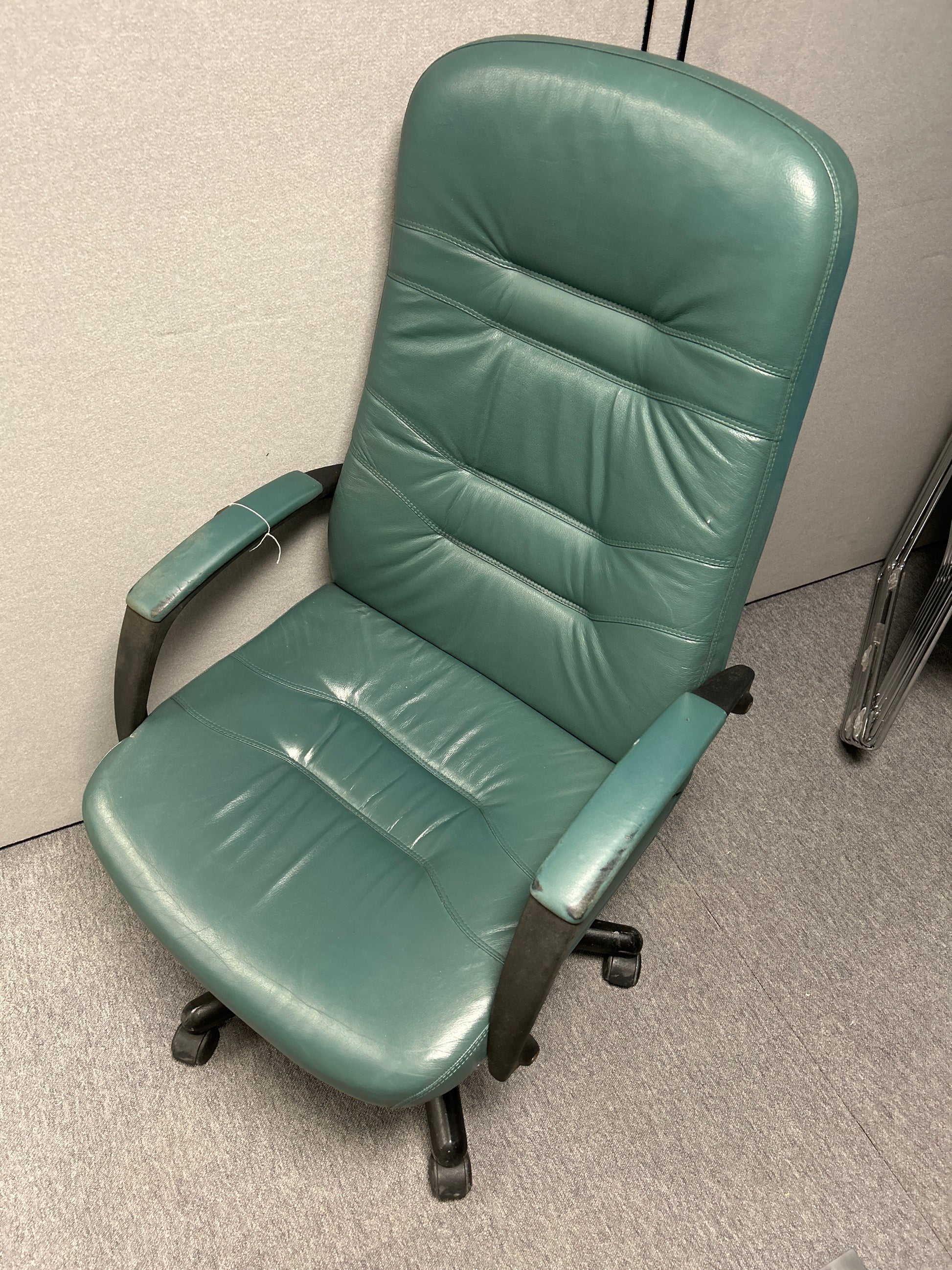High back green leather swivel chair with arms