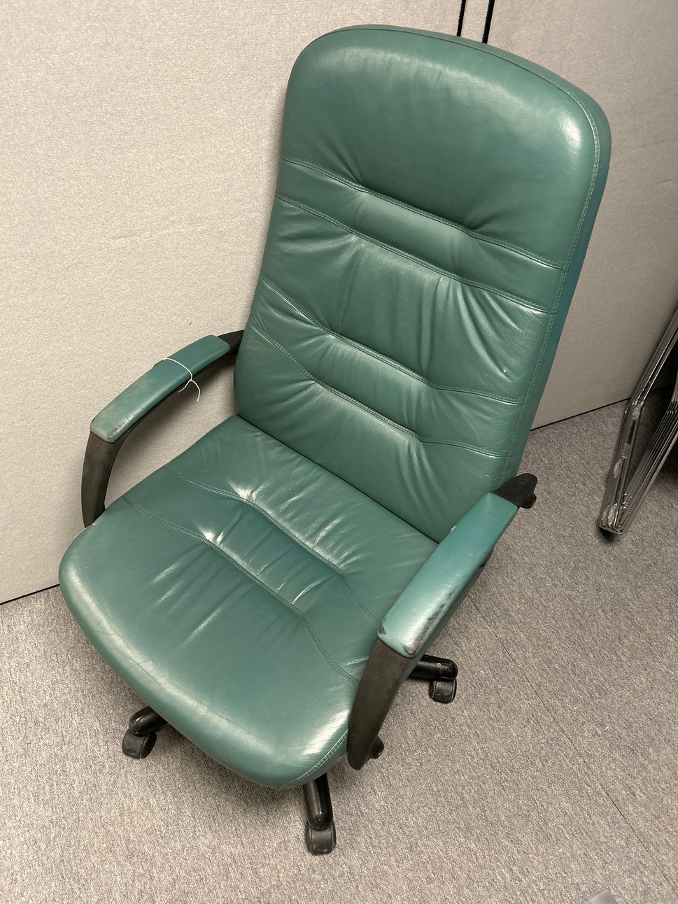 High back green leather swivel chair with arms