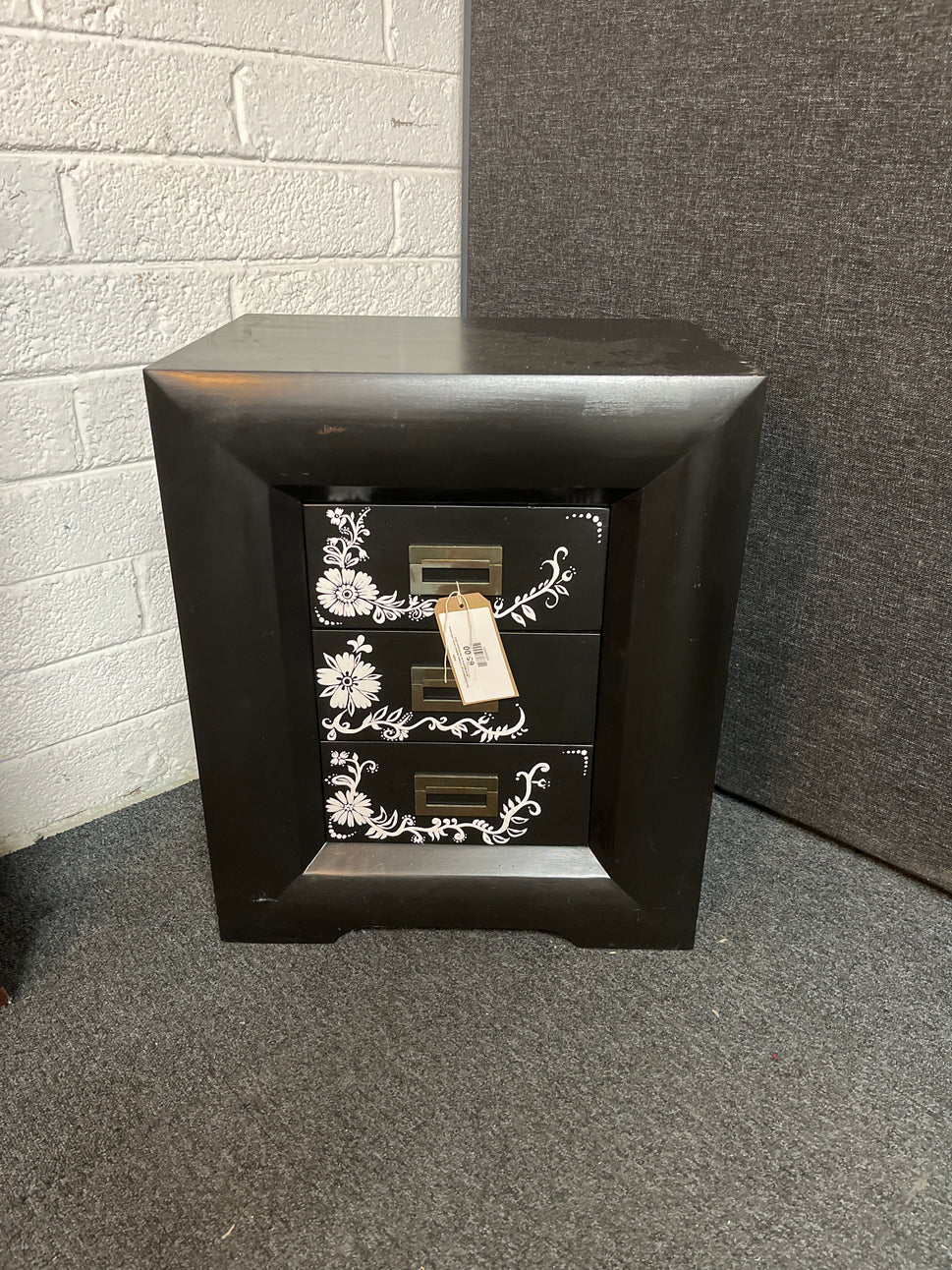 Black painted large 3 drawer bedside locker with black floral detailing on the drawers 3225