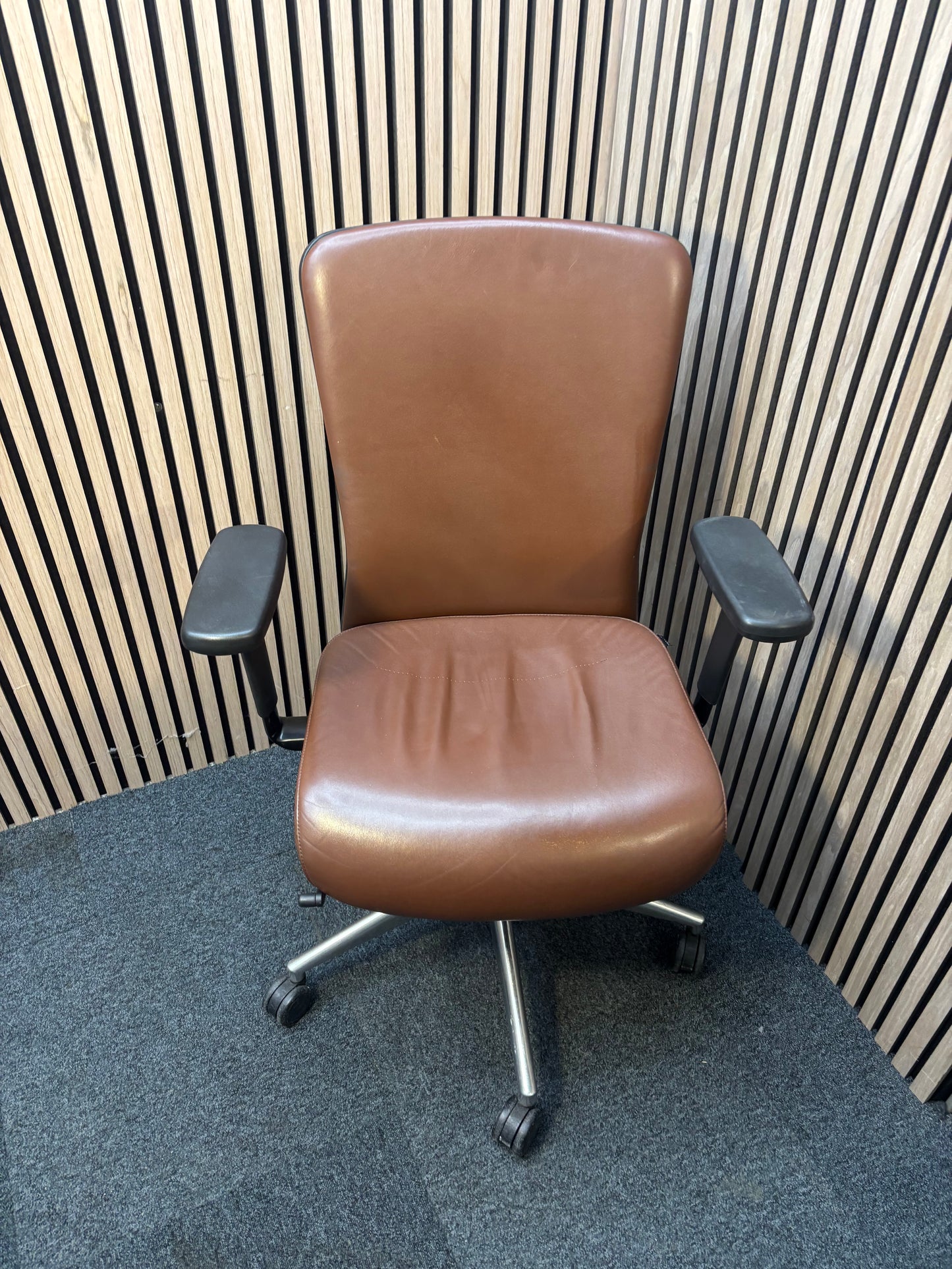 Girsberger high back brown leather multifunction swivel chair with adjustable arms and back rake with polished metal base on castors   J3910