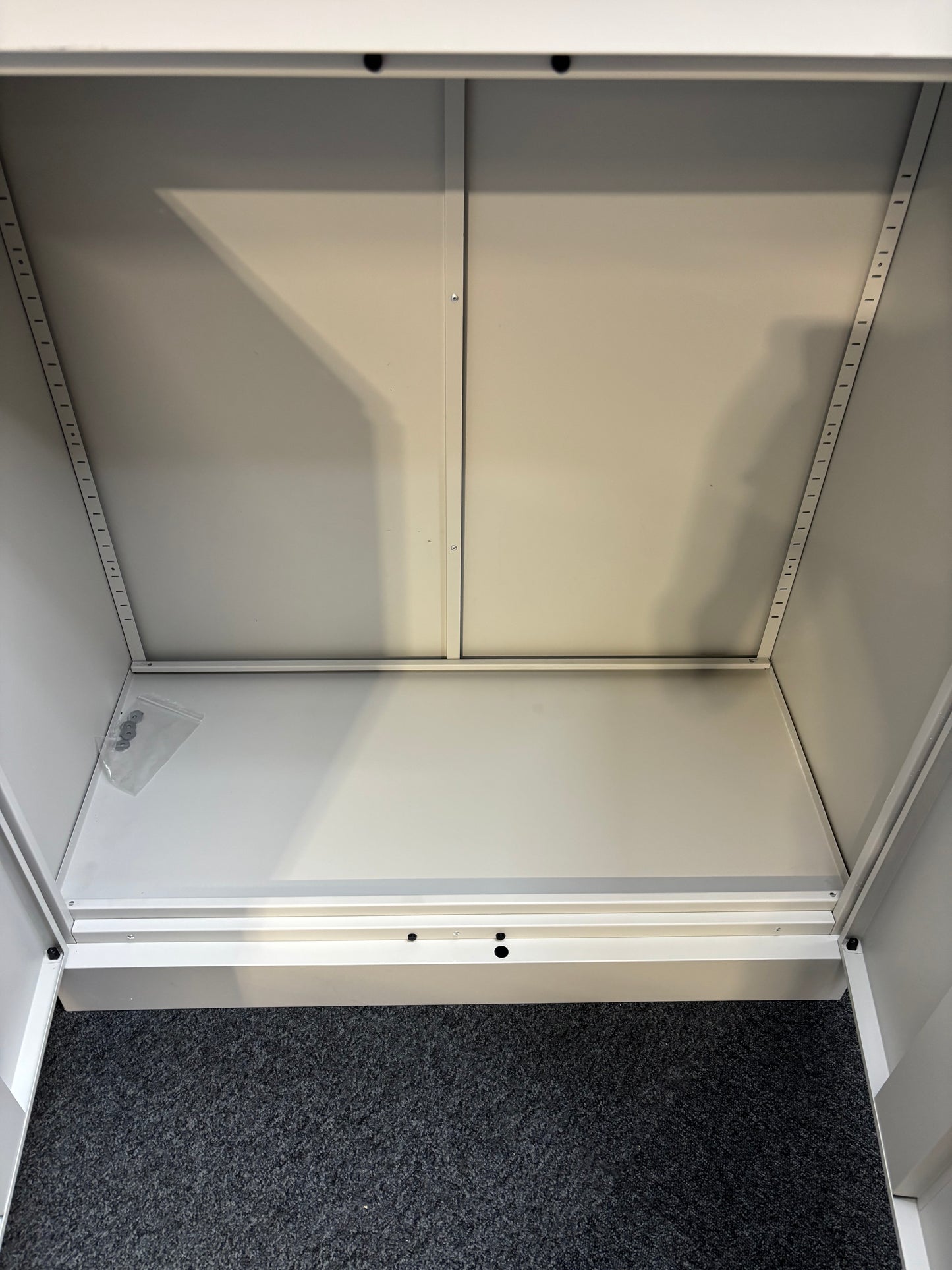 Go low 2 door grey metal storage unit with shelves and key 101Hx91Wx45D
