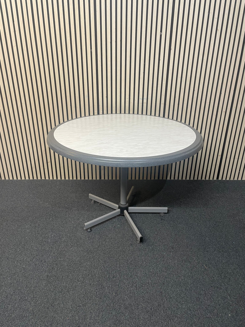 White circular plastic top table with 4 grey metal dining chairs   44652