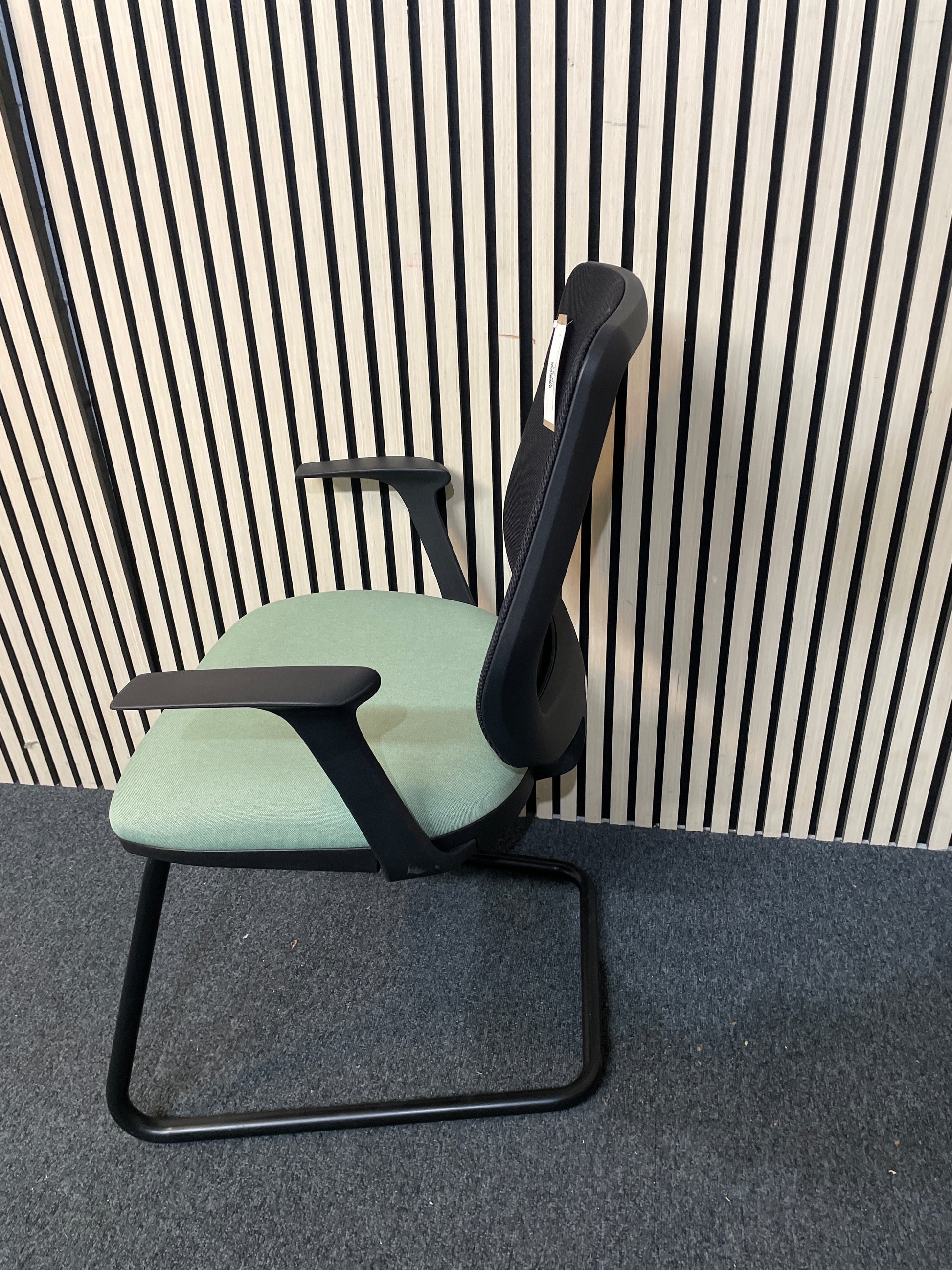 Pawd mesh back cantilever framed meeting chair with jade green fabric seat