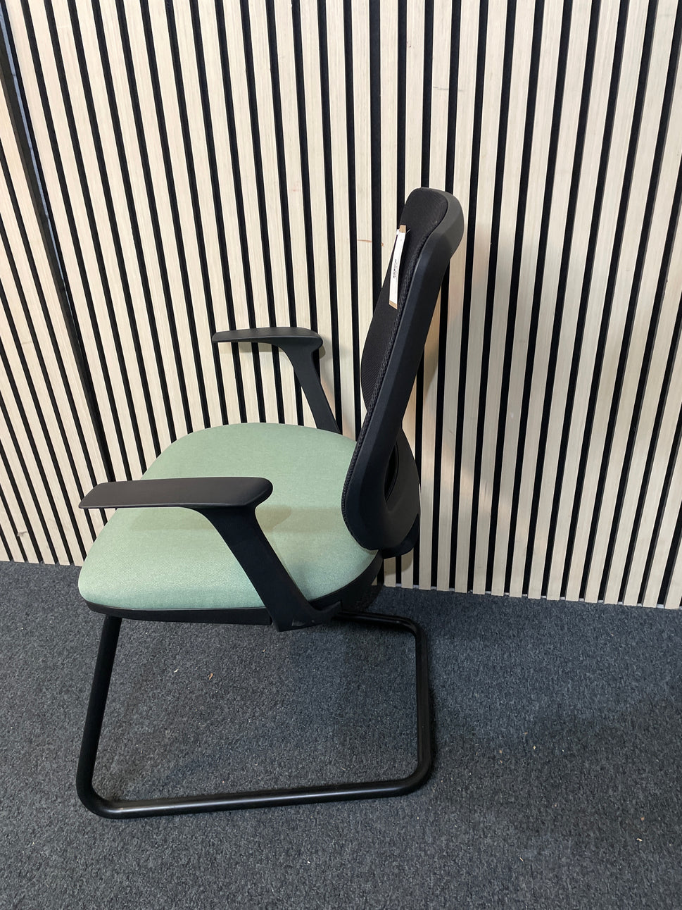 Pawd mesh back cantilever framed meeting chair with jade green fabric seat