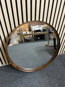 Pair of metal bronze effect circular wall mirrors, 1 large and one small  44447
