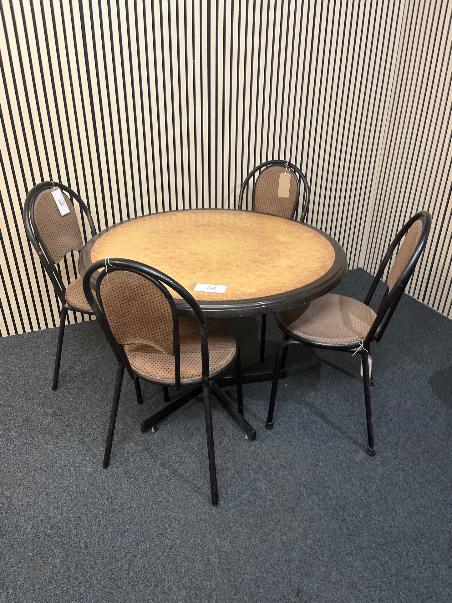 Circular black trim kitchen table with 4 no. black tubular metal framed, brown fabric seat chairs 1425